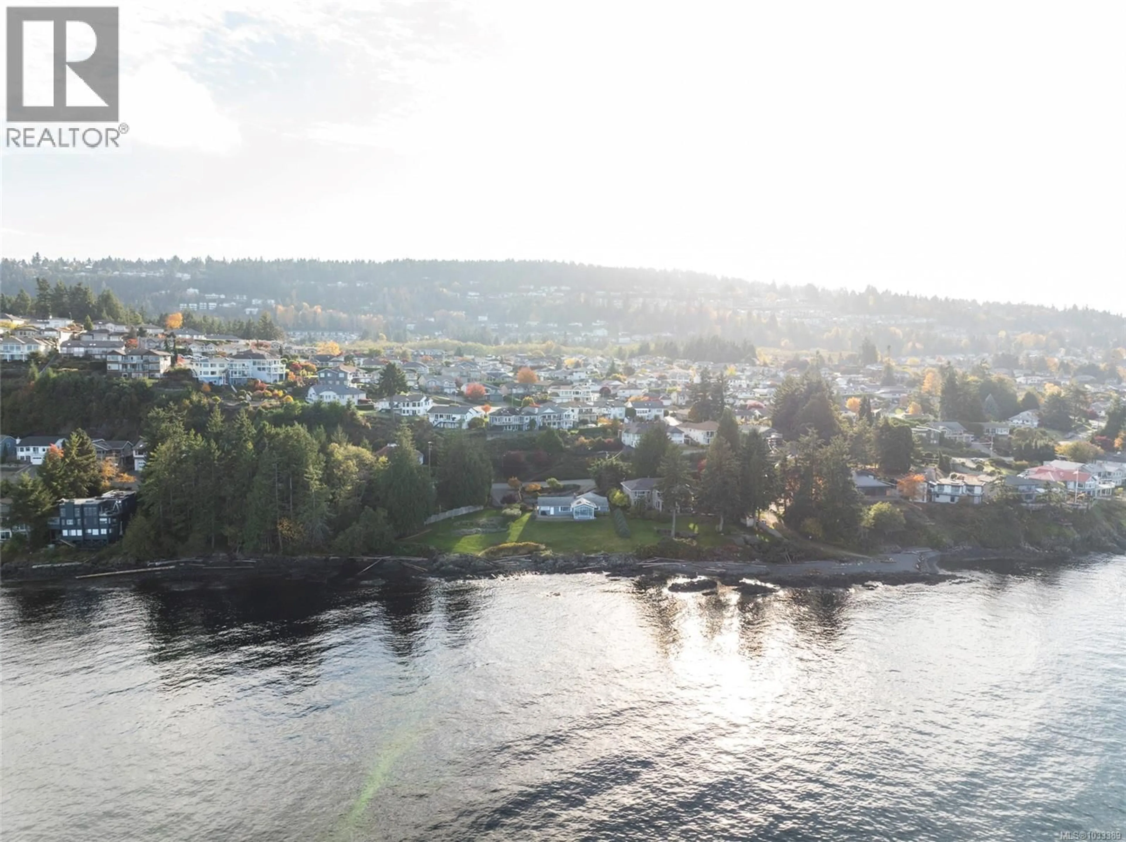 A pic from outside/outdoor area/front of a property/back of a property/a pic from drone, water/lake/river/ocean view for 5020/5010 FILLINGER CRESCENT, Nanaimo British Columbia V9V1J1