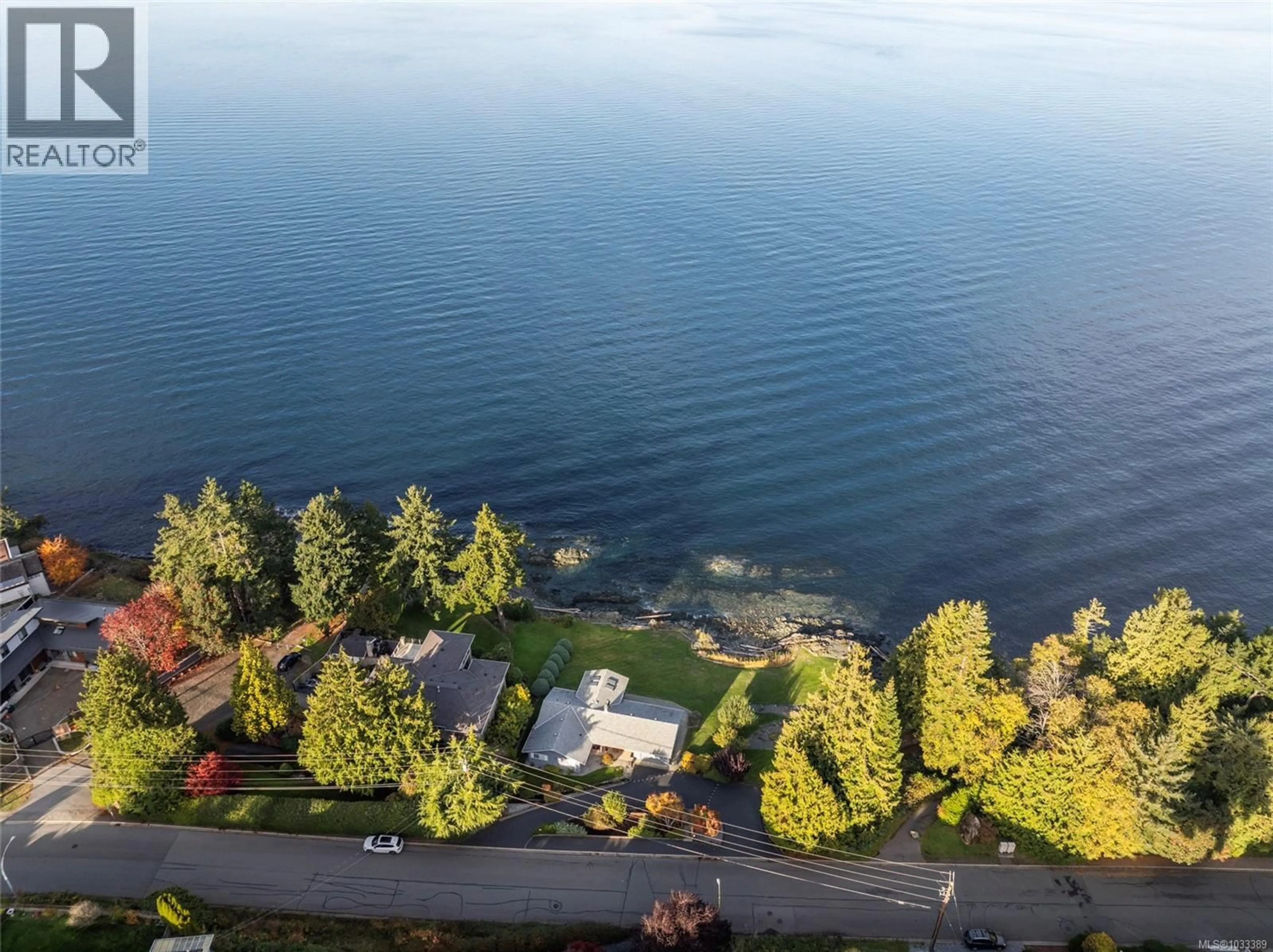 A pic from outside/outdoor area/front of a property/back of a property/a pic from drone, water/lake/river/ocean view for 5020/5010 FILLINGER CRESCENT, Nanaimo British Columbia V9V1J1