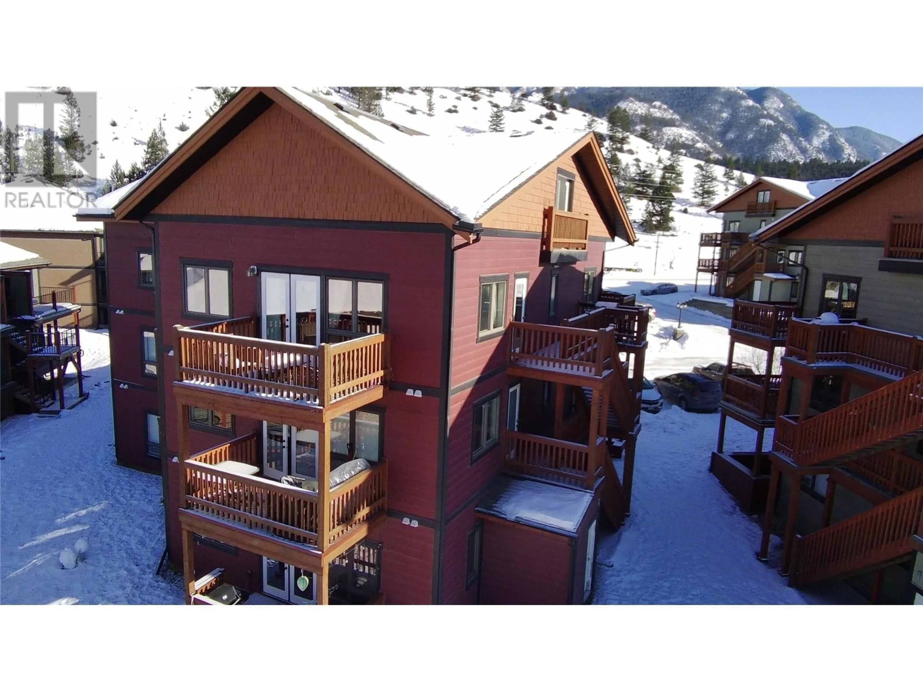 A pic from outside/outdoor area/front of a property/back of a property/a pic from drone, mountain view for 7337 Prospector Avenue Avenue Unit# 205, Radium Hot Springs British Columbia V0A1M0