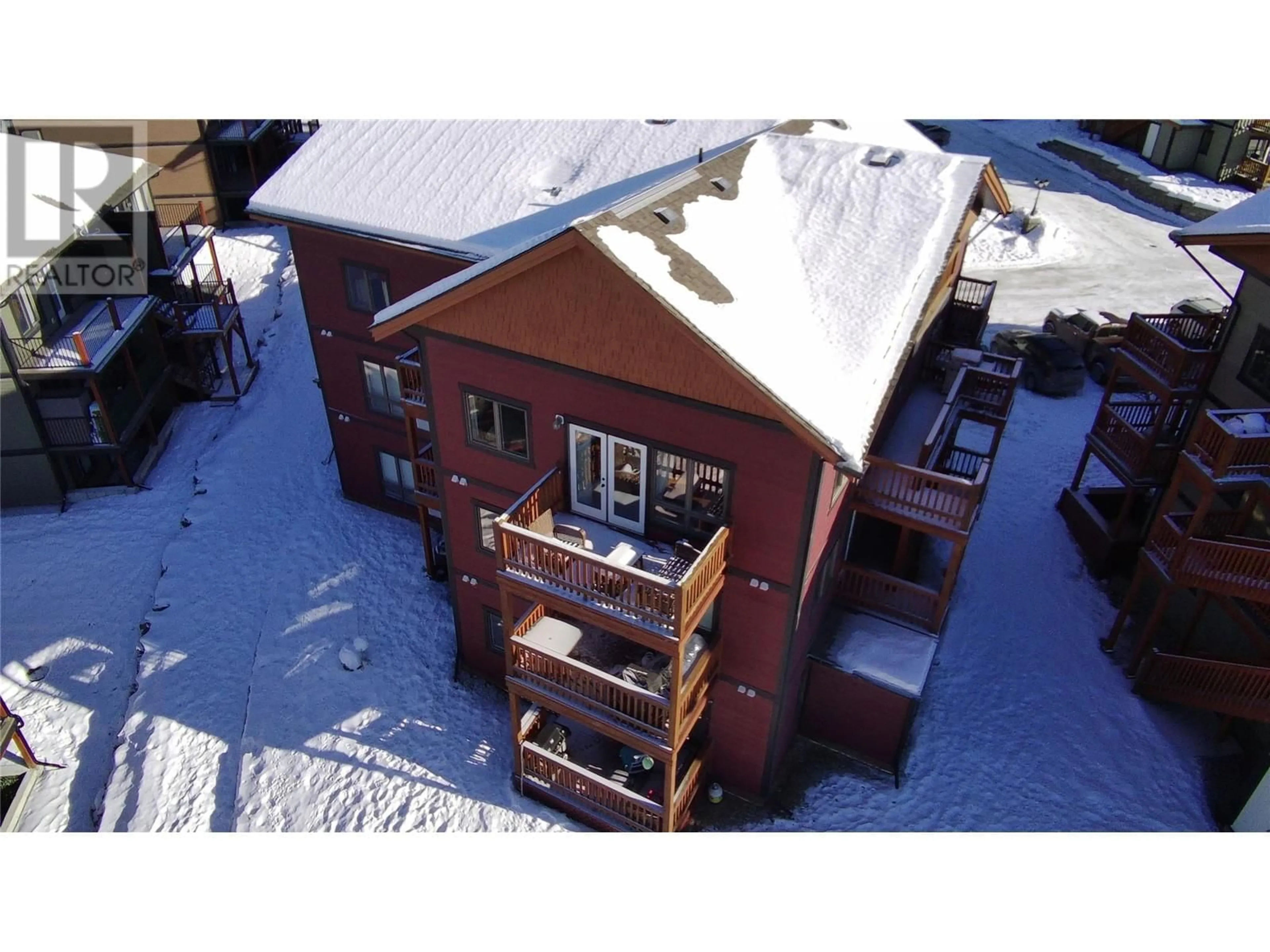 A pic from outside/outdoor area/front of a property/back of a property/a pic from drone, building for 7337 Prospector Avenue Avenue Unit# 205, Radium Hot Springs British Columbia V0A1M0