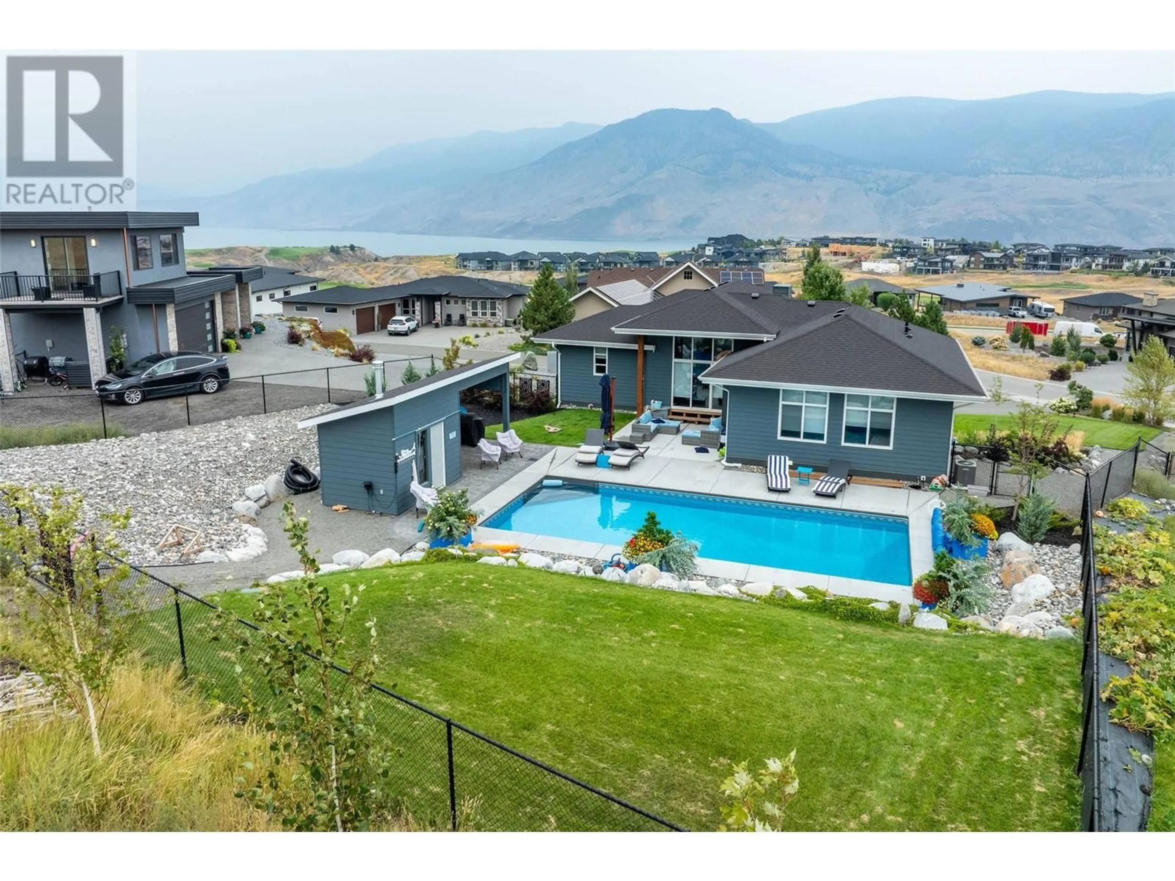 A pic from outside/outdoor area/front of a property/back of a property/a pic from drone, mountain view for 115 CAVESSON Way, Kamloops British Columbia V1S0B3