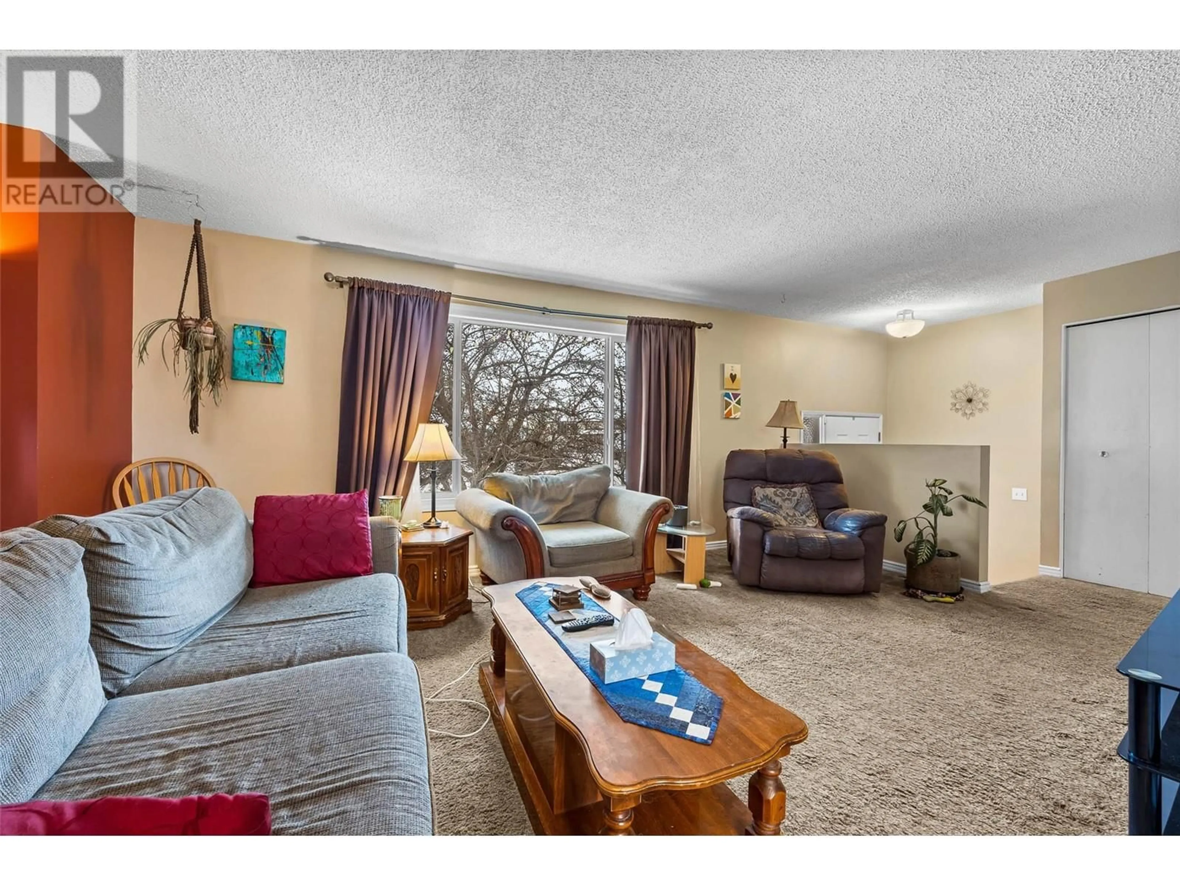 Living room with furniture, unknown for 226 Dogwood Place, Logan Lake British Columbia V0K1W0