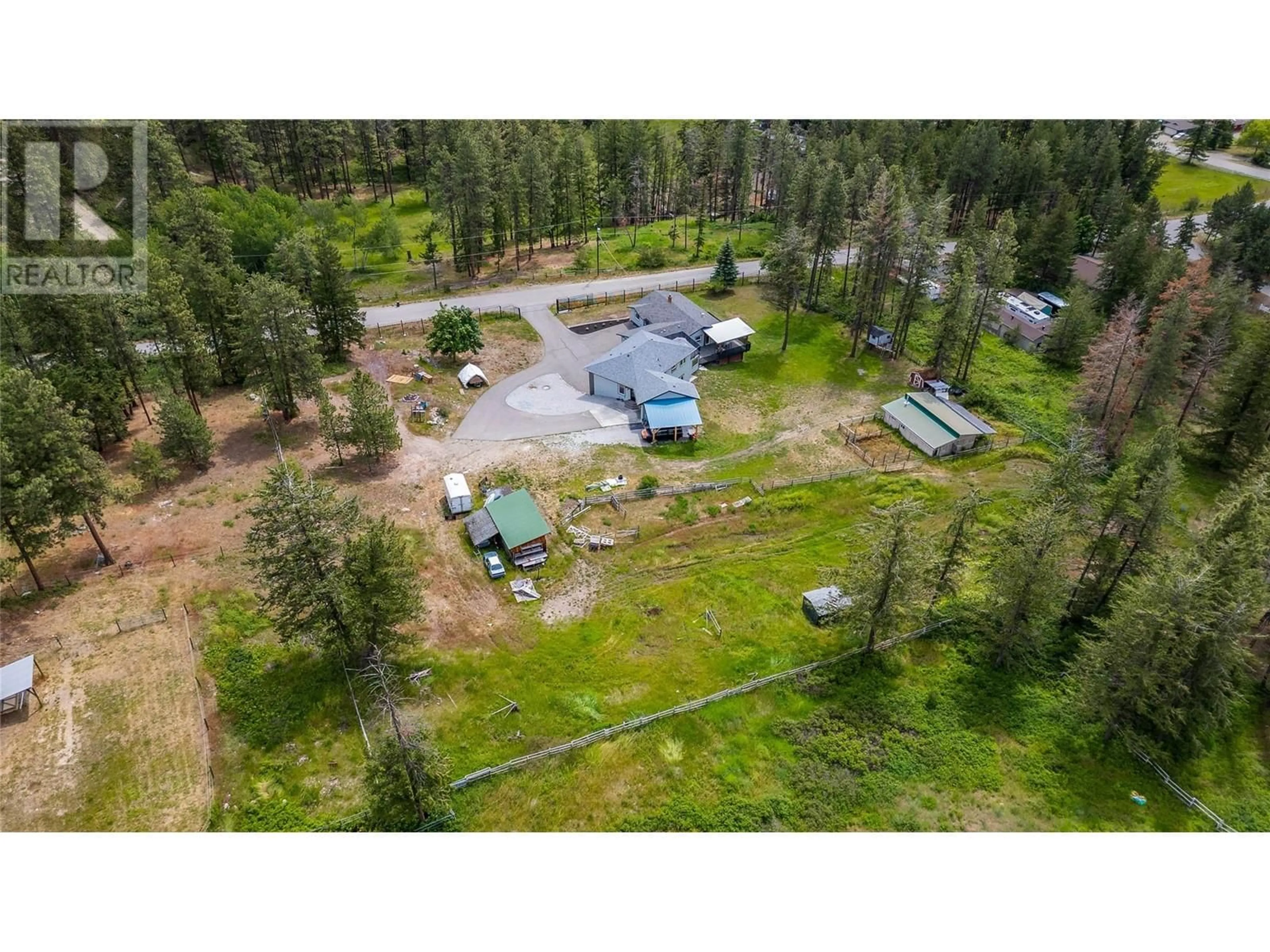 A pic from outside/outdoor area/front of a property/back of a property/a pic from drone, unknown for 5308 Law Street, Peachland British Columbia V0H1X8