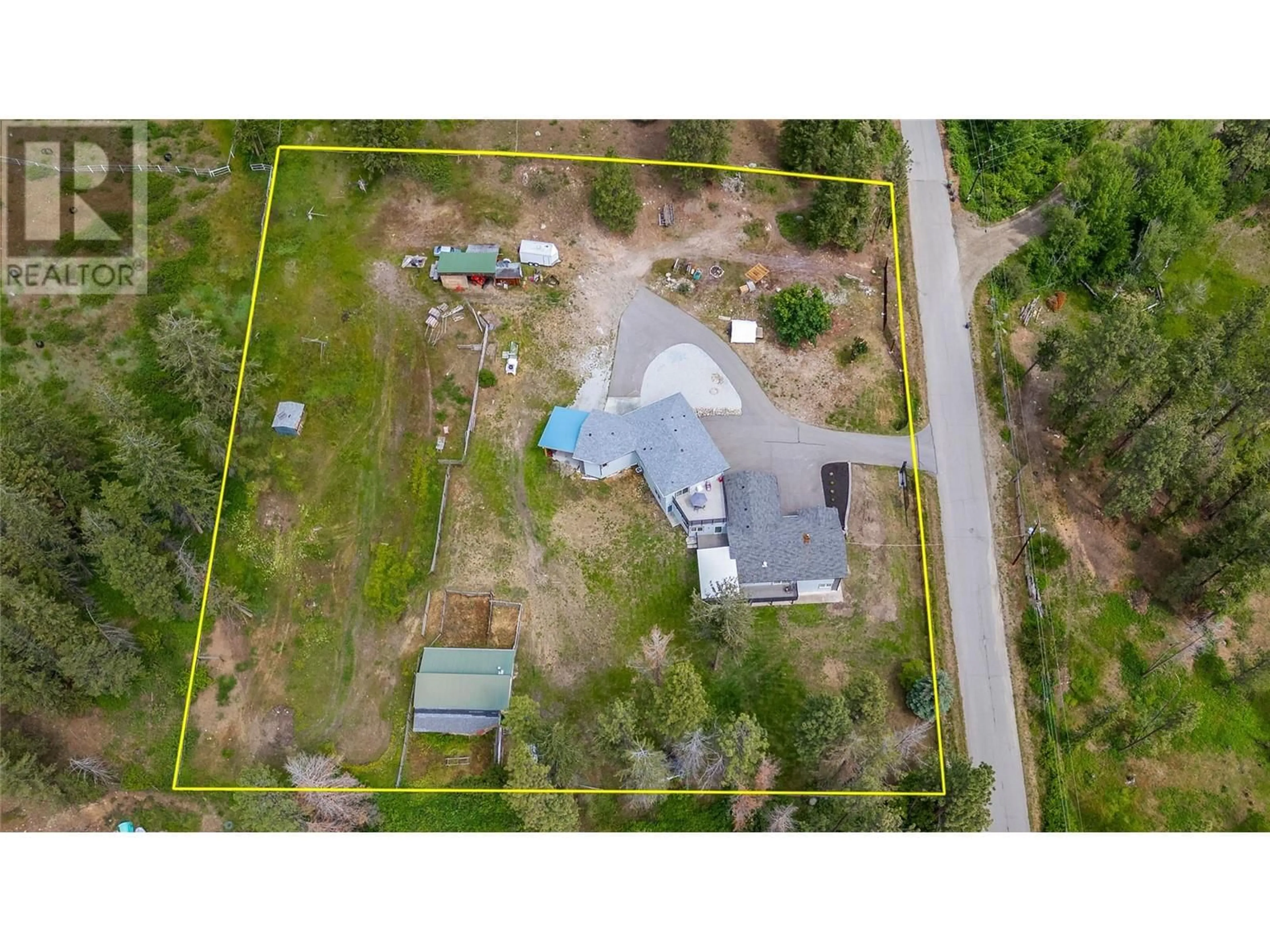 A pic from outside/outdoor area/front of a property/back of a property/a pic from drone, unknown for 5308 Law Street, Peachland British Columbia V0H1X8