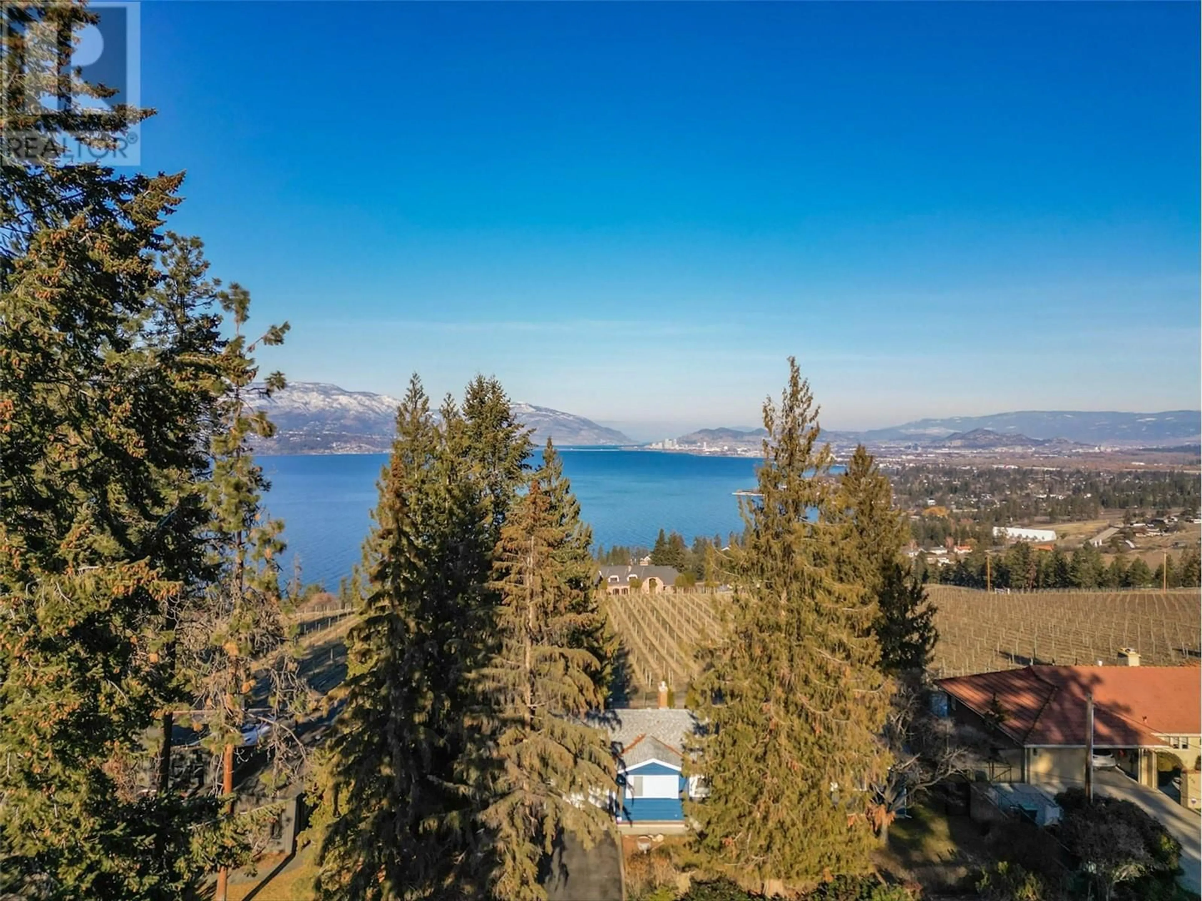 A pic from outside/outdoor area/front of a property/back of a property/a pic from drone, water/lake/river/ocean view for 442 Okaview Road, Kelowna British Columbia V1W4L4