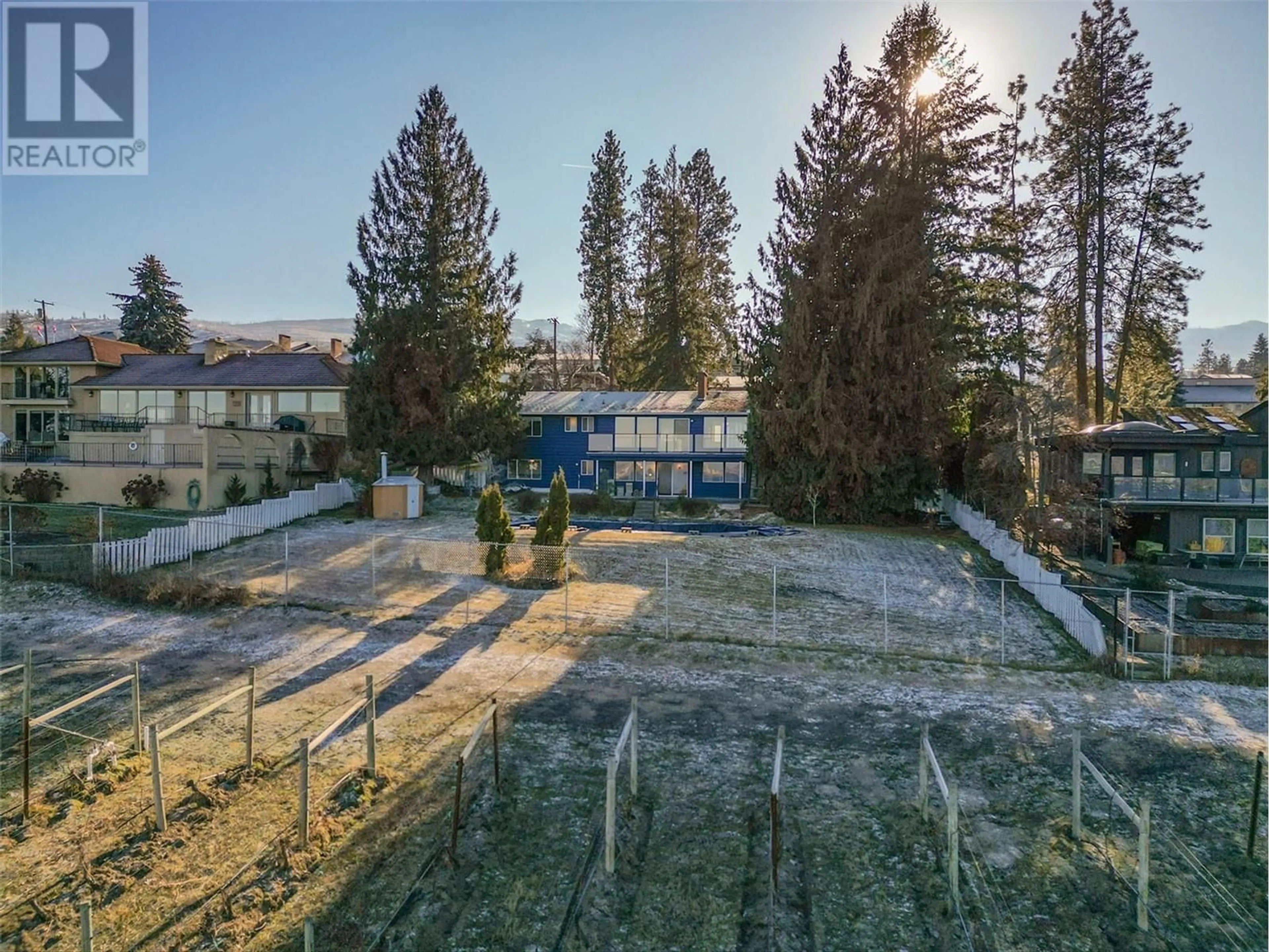 A pic from outside/outdoor area/front of a property/back of a property/a pic from drone, mountain view for 442 Okaview Road, Kelowna British Columbia V1W4L4