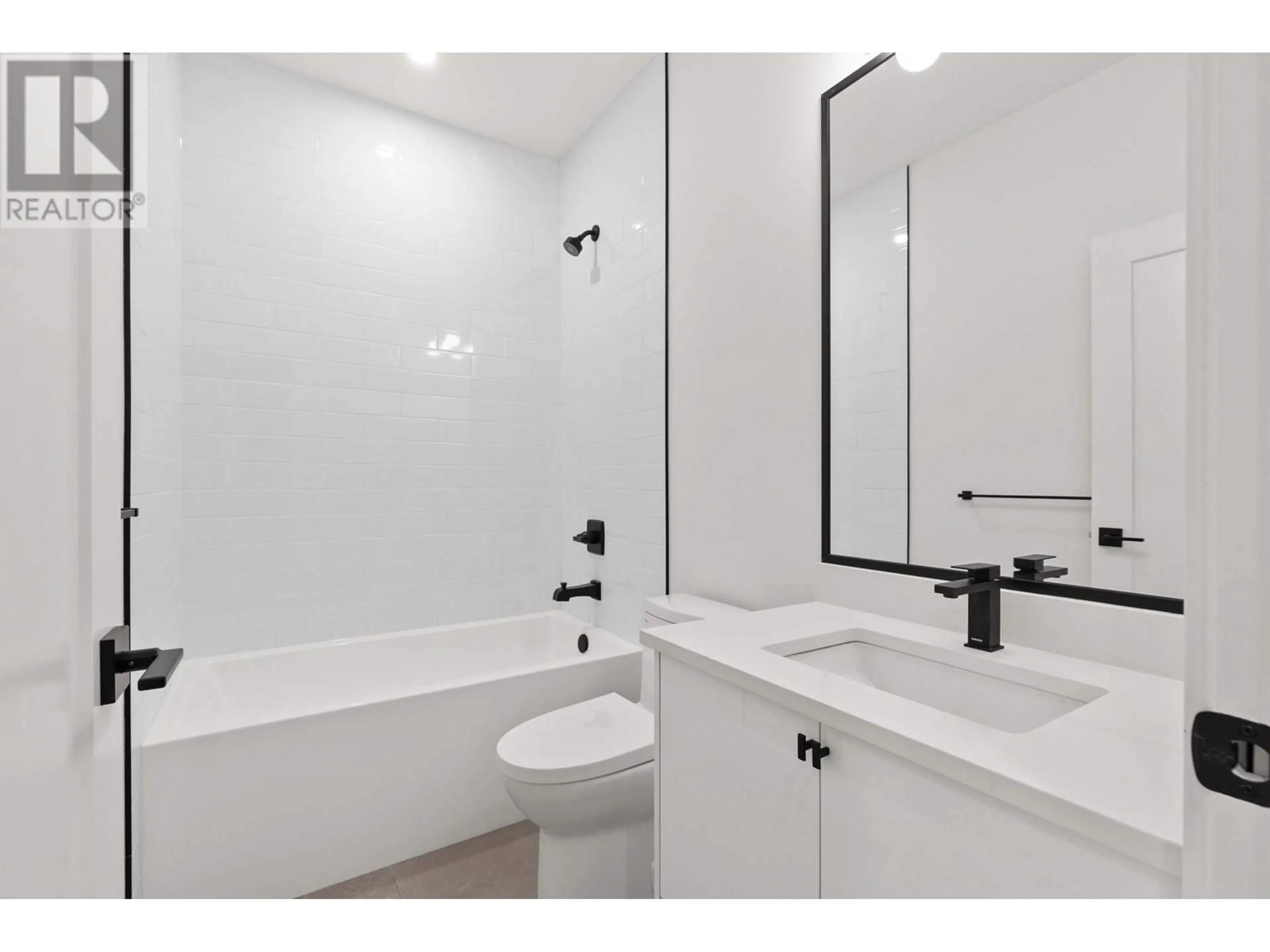 Standard bathroom, ceramic/tile floor for 781 Raymer Avenue Unit# 2, Kelowna British Columbia V1Y4Z7