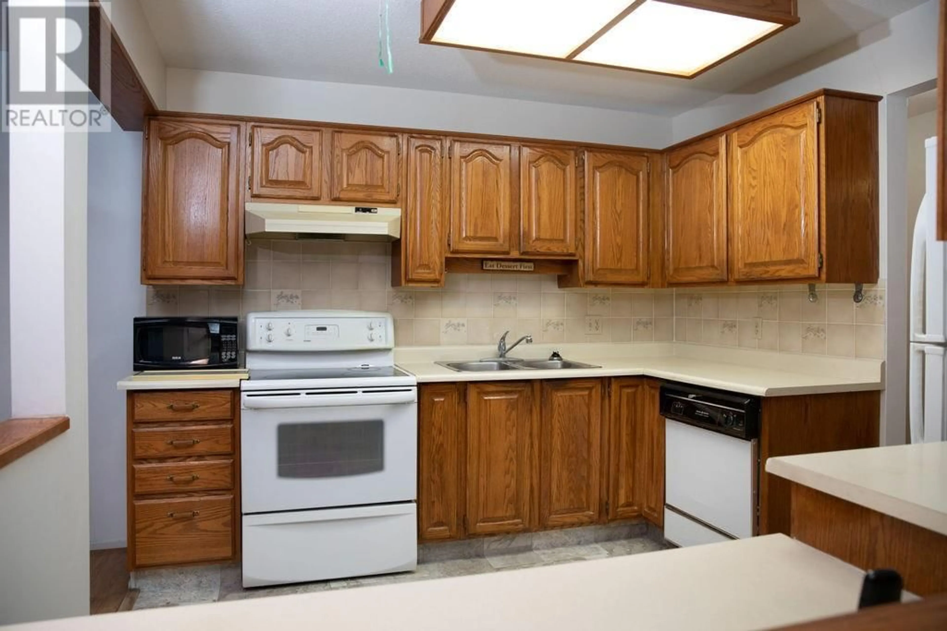 Standard kitchen, unknown for 207 - 1610 GORDON DRIVE, Kelowna British Columbia V1Y3G9