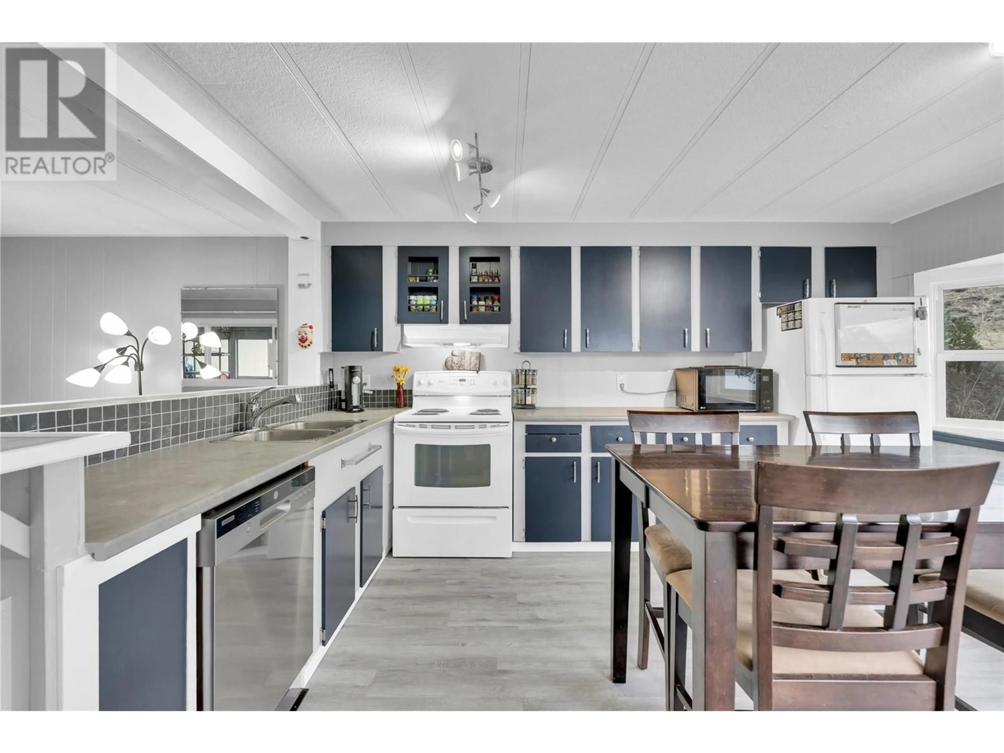 Open concept kitchen, unknown for 201 Highway 97 Unit# 63, Penticton British Columbia V2A6J7