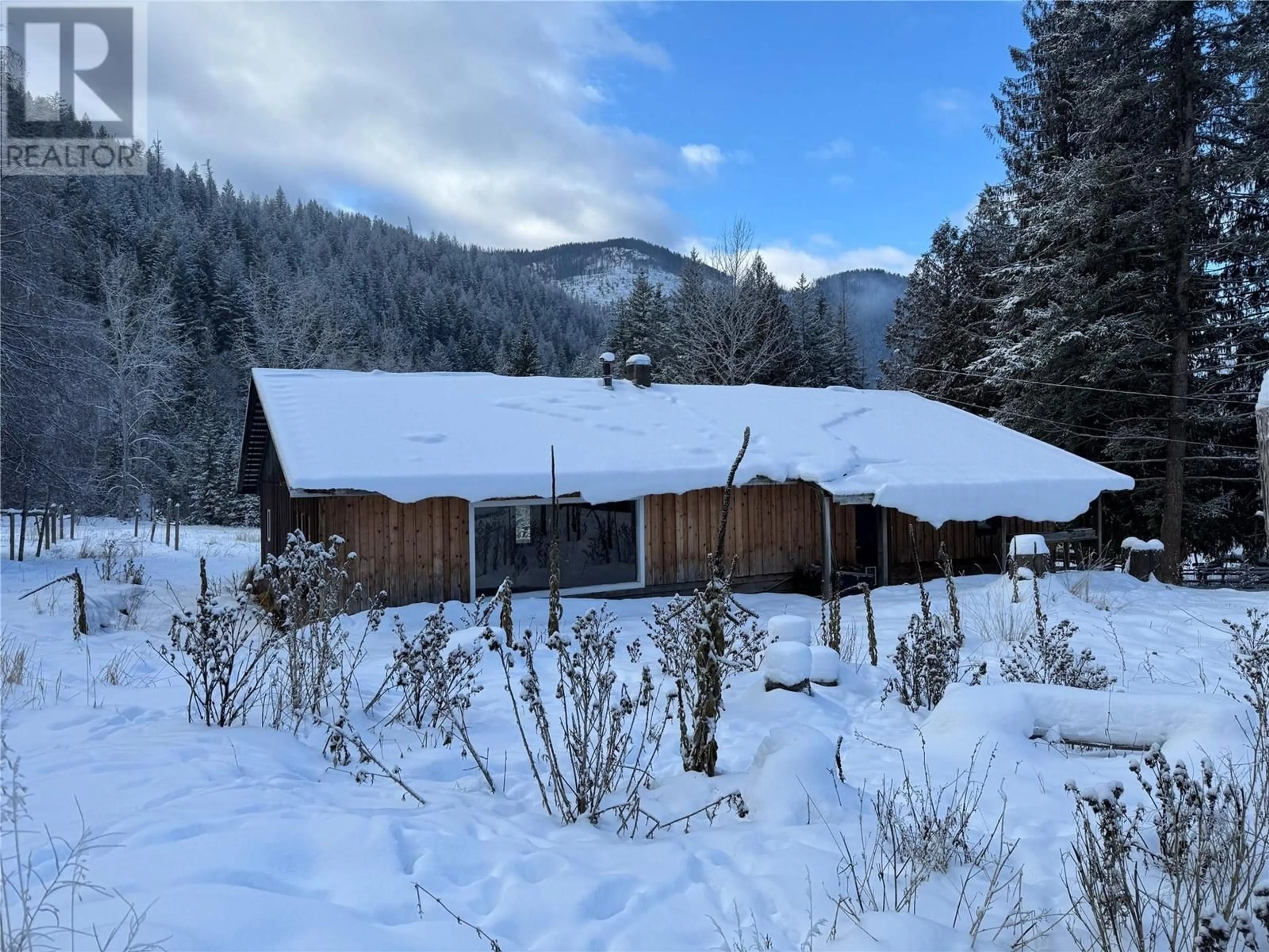 A pic from outside/outdoor area/front of a property/back of a property/a pic from drone, mountain view for 1538 Creighton Valley Road, Lumby British Columbia V0E2G1