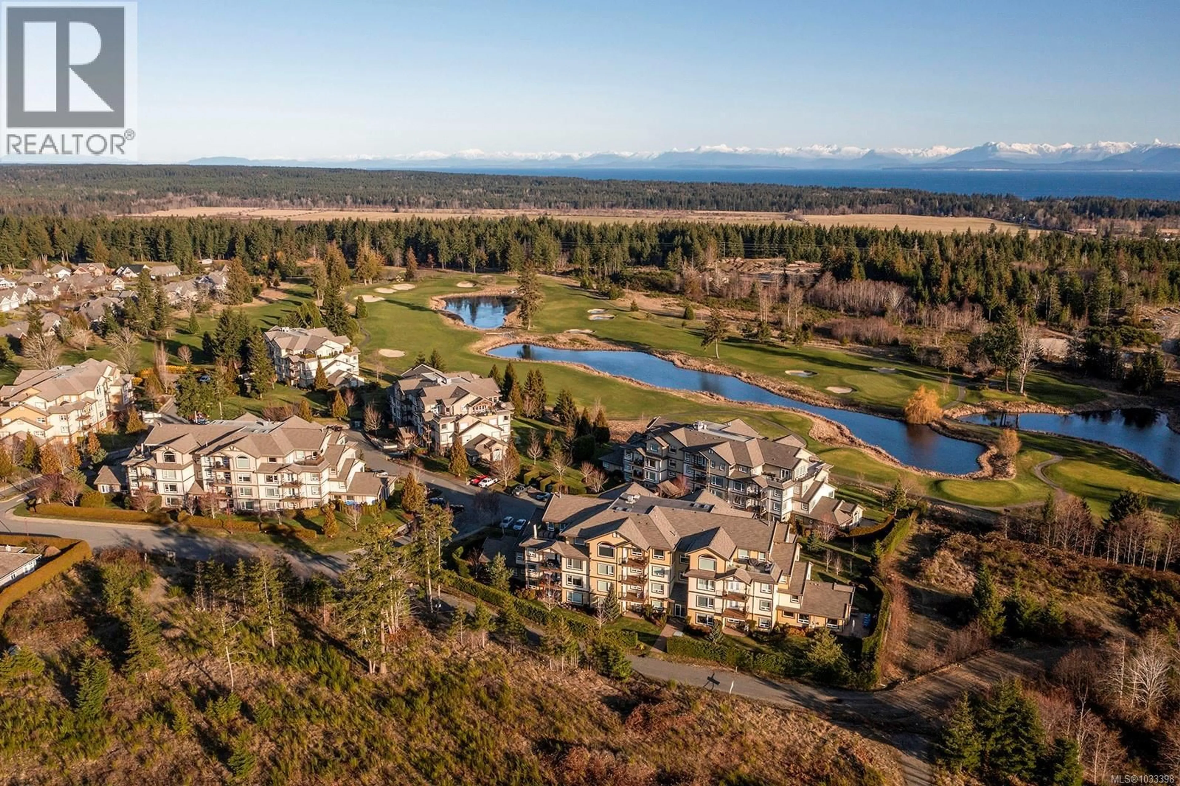 A pic from outside/outdoor area/front of a property/back of a property/a pic from drone, water/lake/river/ocean view for 435 - 3666 ROYAL VISTA WAY, Courtenay British Columbia V9N9X8