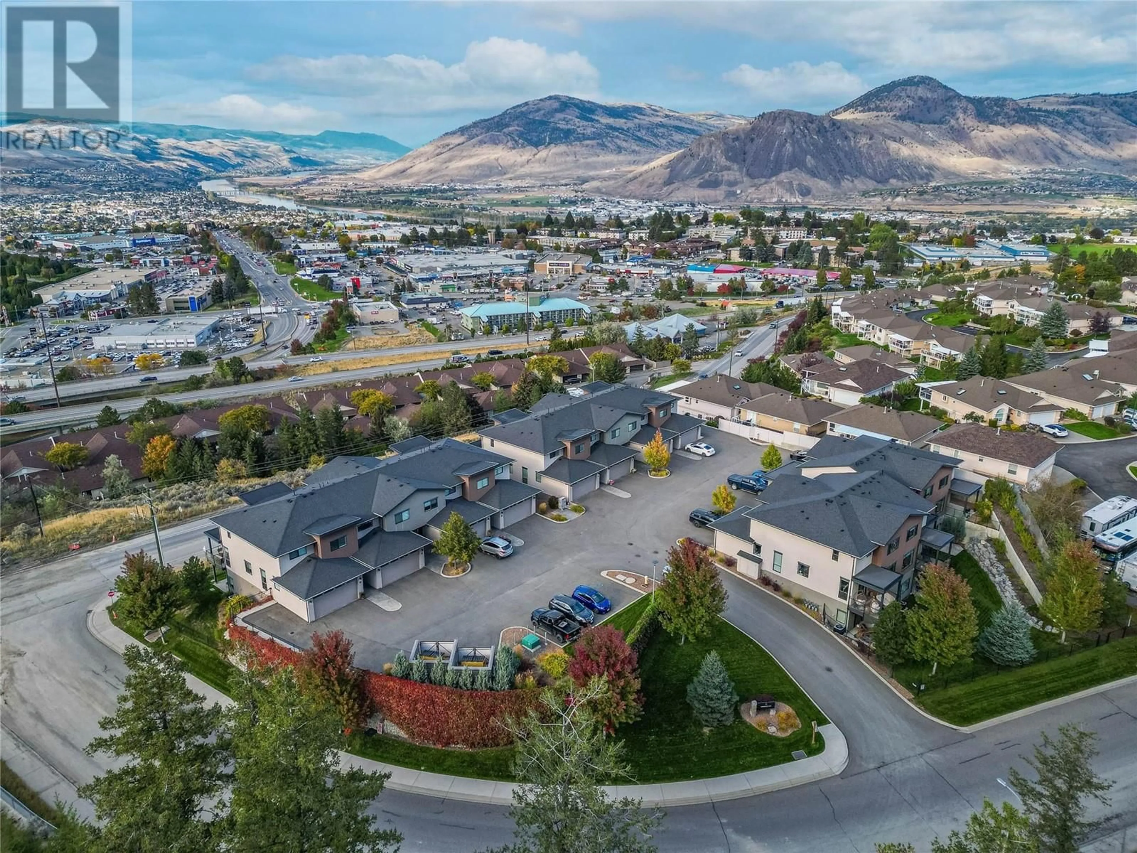 A pic from outside/outdoor area/front of a property/back of a property/a pic from drone, mountain view for 580 Sedona Drive Unit# 108, Kamloops British Columbia V2E1H6