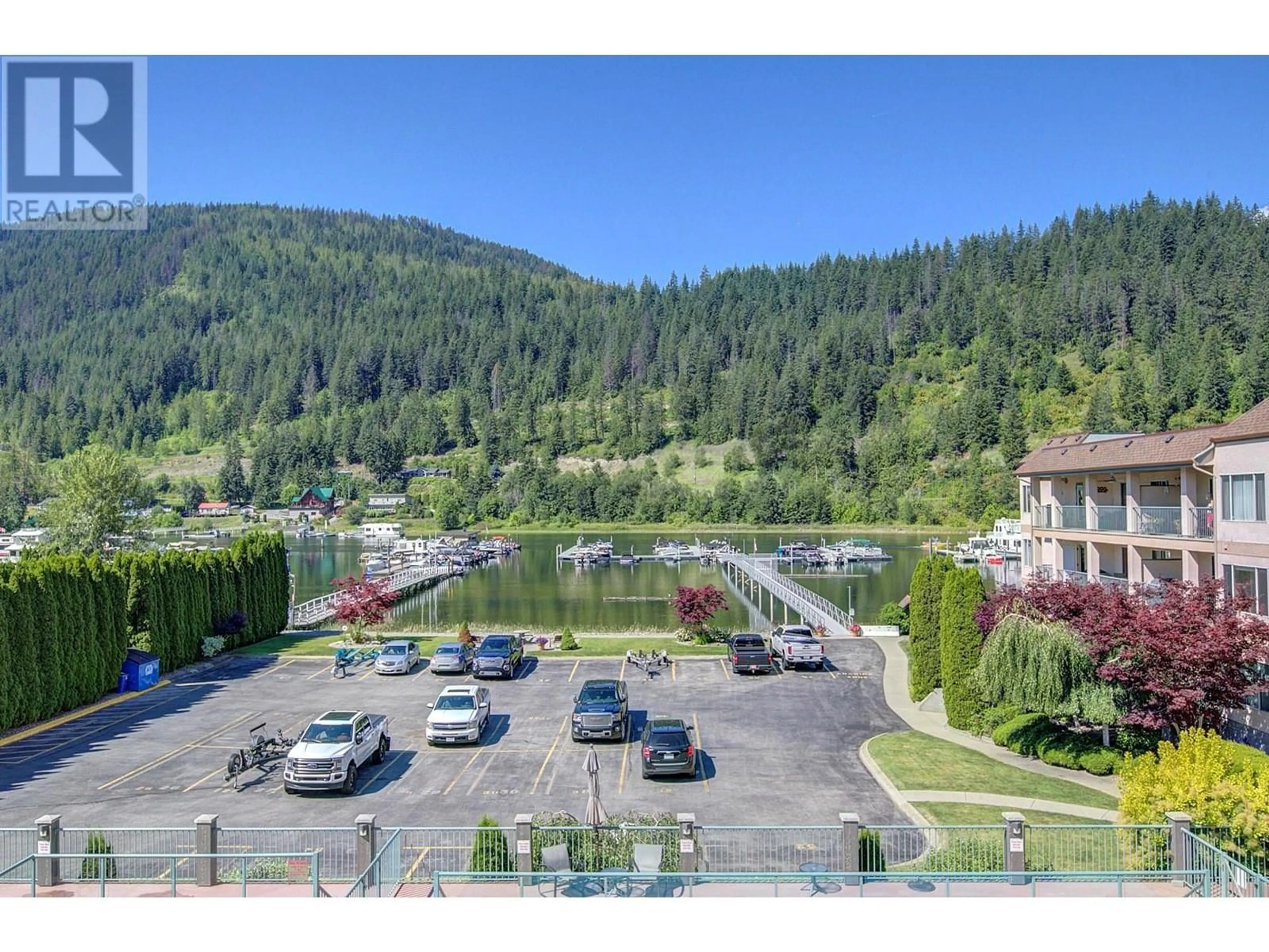 A pic from outside/outdoor area/front of a property/back of a property/a pic from drone, mountain view for 1002 Riverside Avenue Unit# 305, Sicamous British Columbia V0E2V1