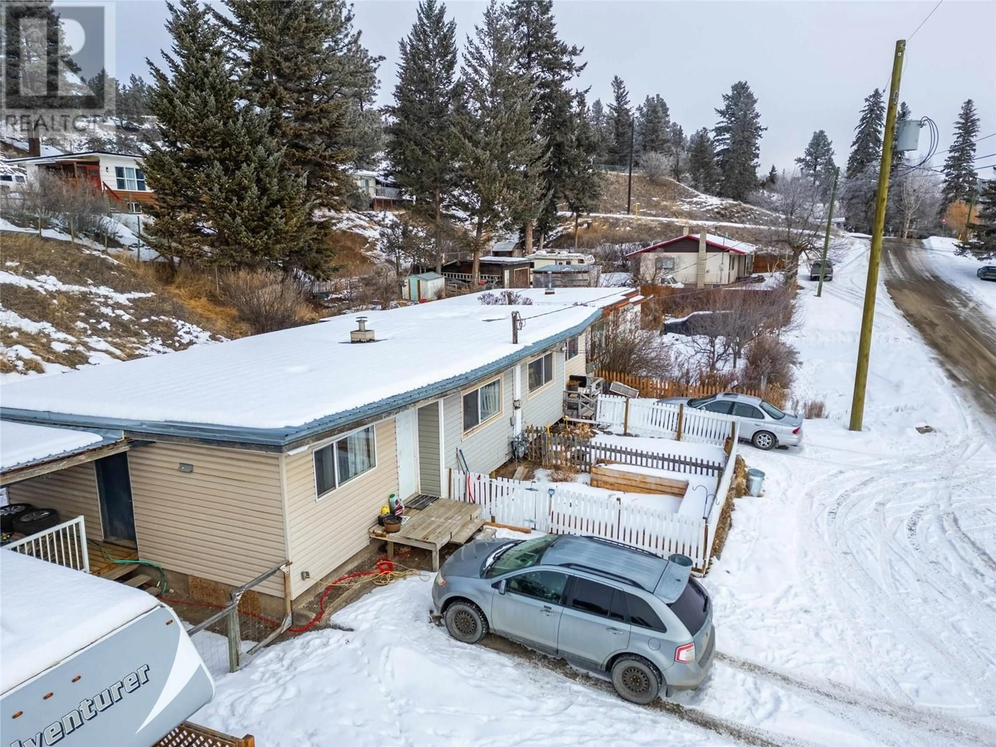 A pic from outside/outdoor area/front of a property/back of a property/a pic from drone, street for 1504 Carson Street, Clinton British Columbia V0K1K0