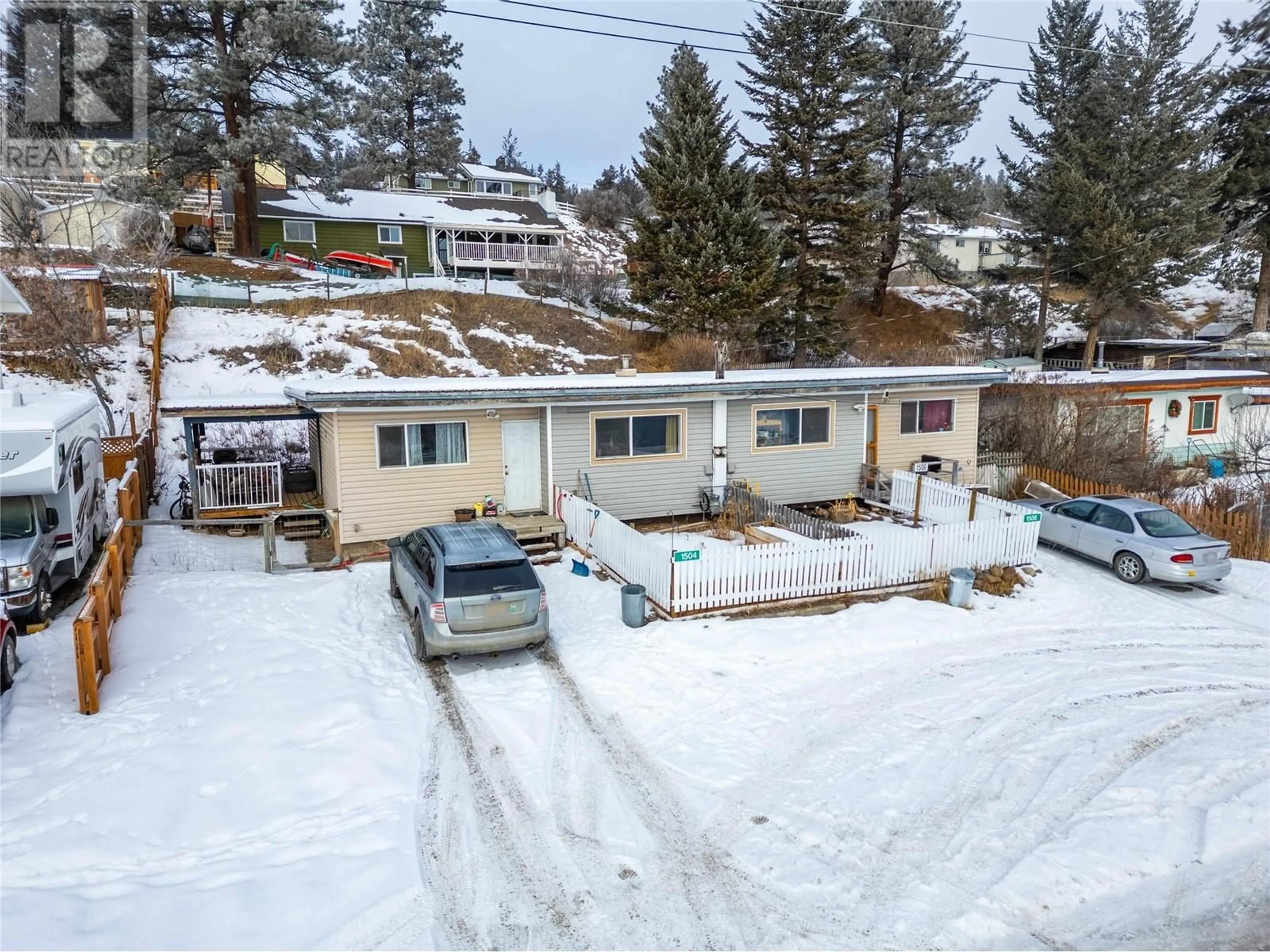 A pic from outside/outdoor area/front of a property/back of a property/a pic from drone, street for 1504 Carson Street, Clinton British Columbia V0K1K0