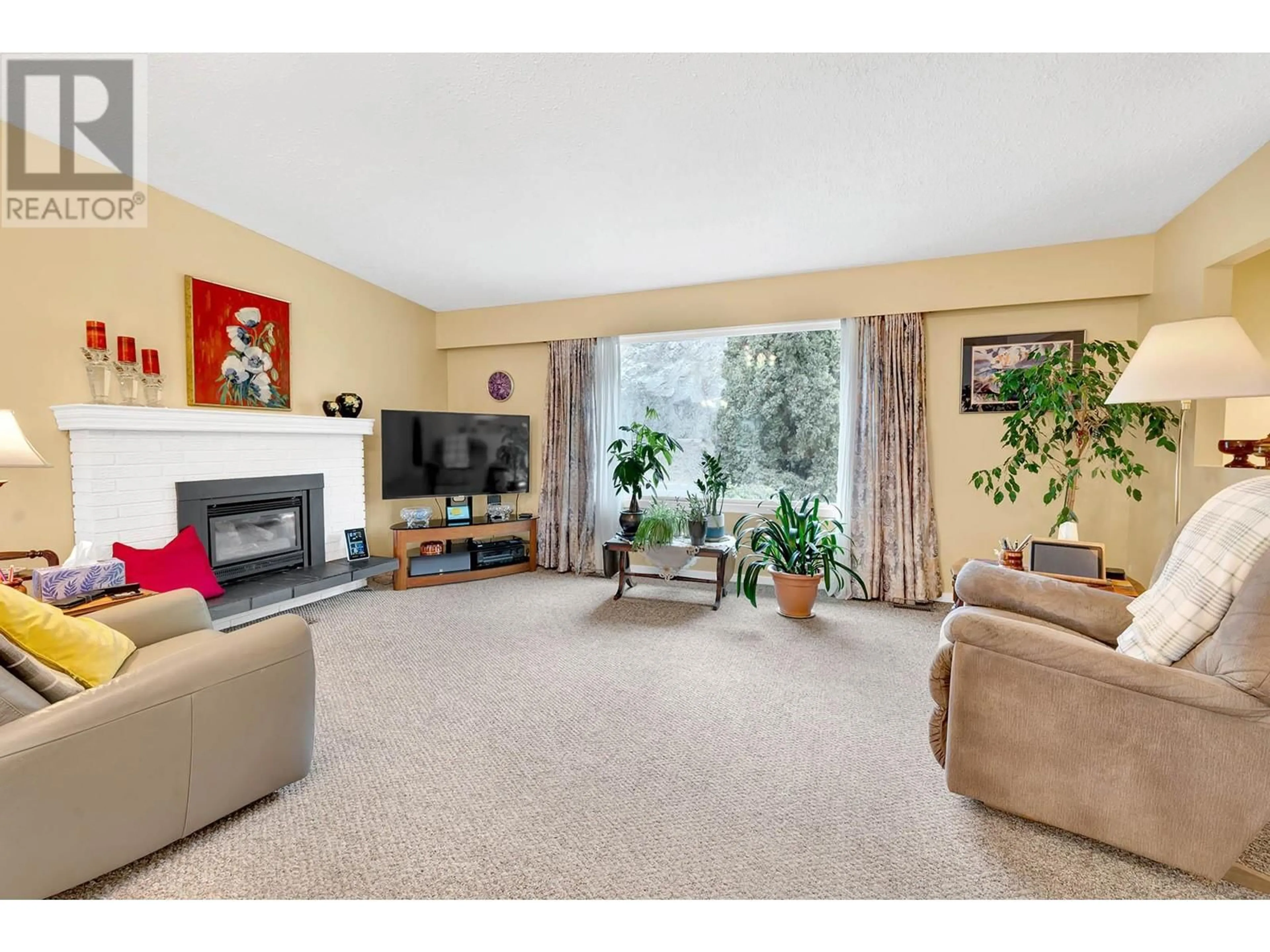 Living room with furniture, carpet floor for 3957 Old Yellowhead Highway, Kamloops British Columbia V2H1K6