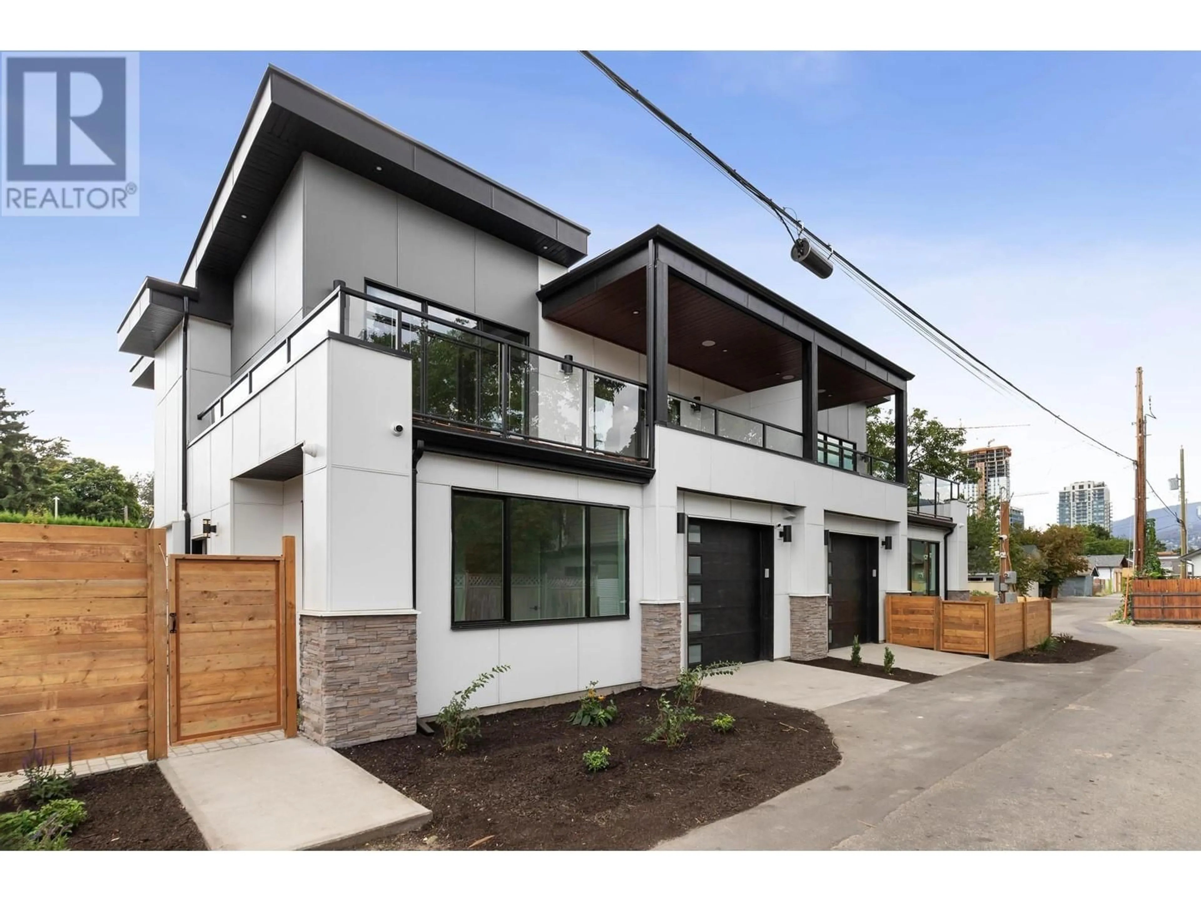 Home with brick exterior material, street for 1 - 1450 ETHEL STREET, Kelowna British Columbia V1Y2X7