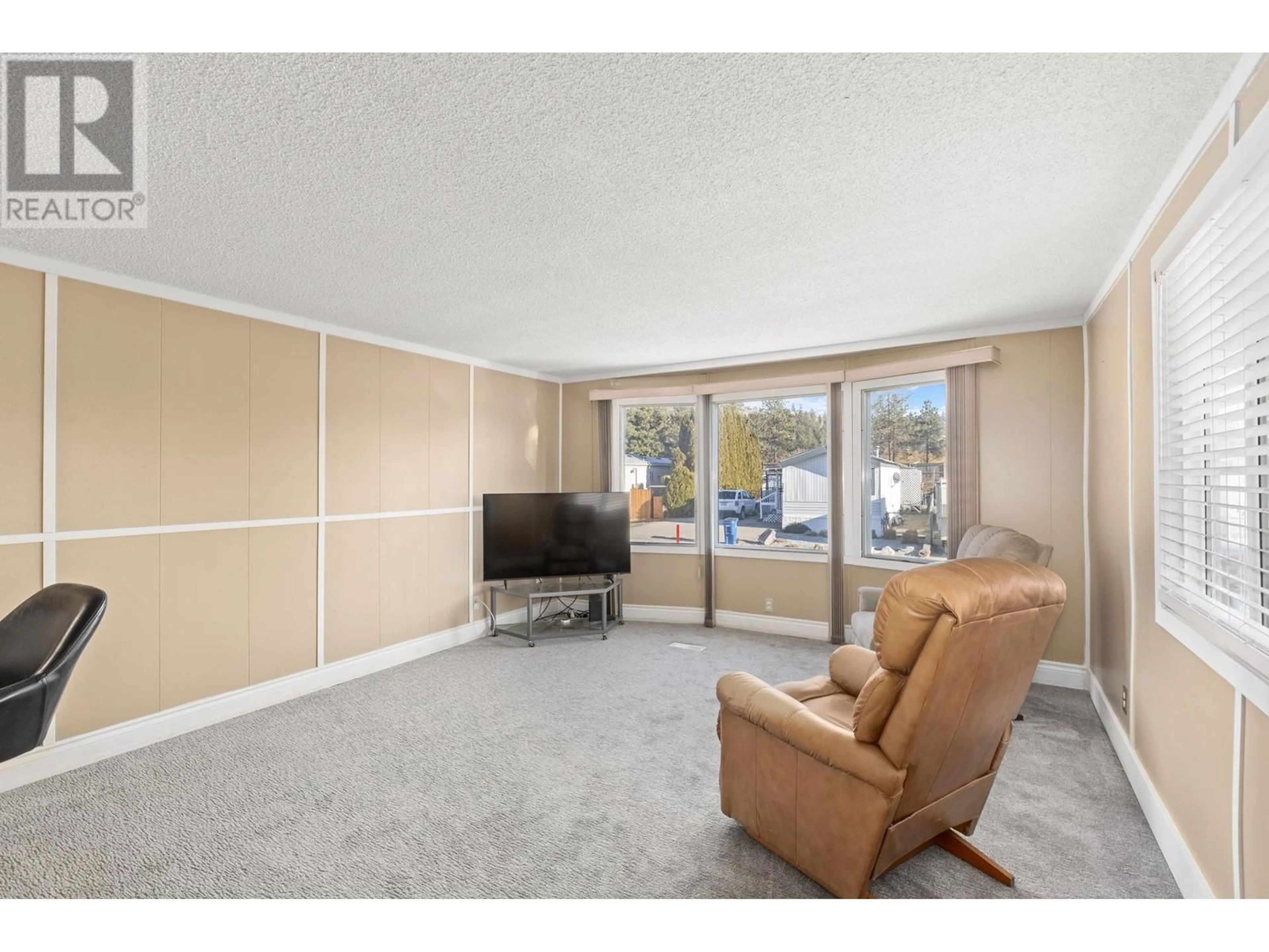 Living room with furniture, unknown for 250 - 2001 97 HIGHWAY SOUTH, Westbank British Columbia V1Z3E3
