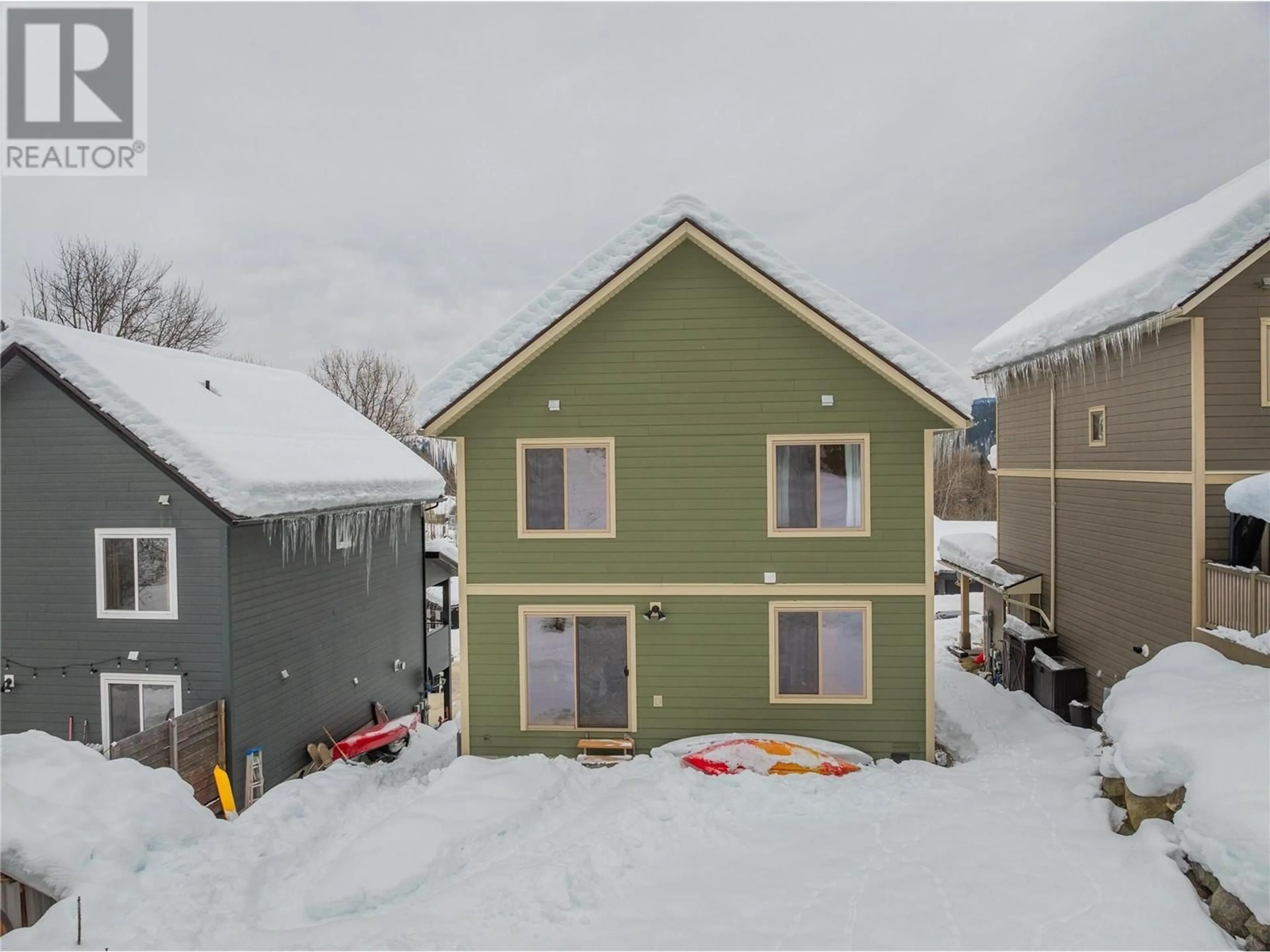 A pic from outside/outdoor area/front of a property/back of a property/a pic from drone, street for 750 REDSTONE Drive, Rossland British Columbia V0G1Y0