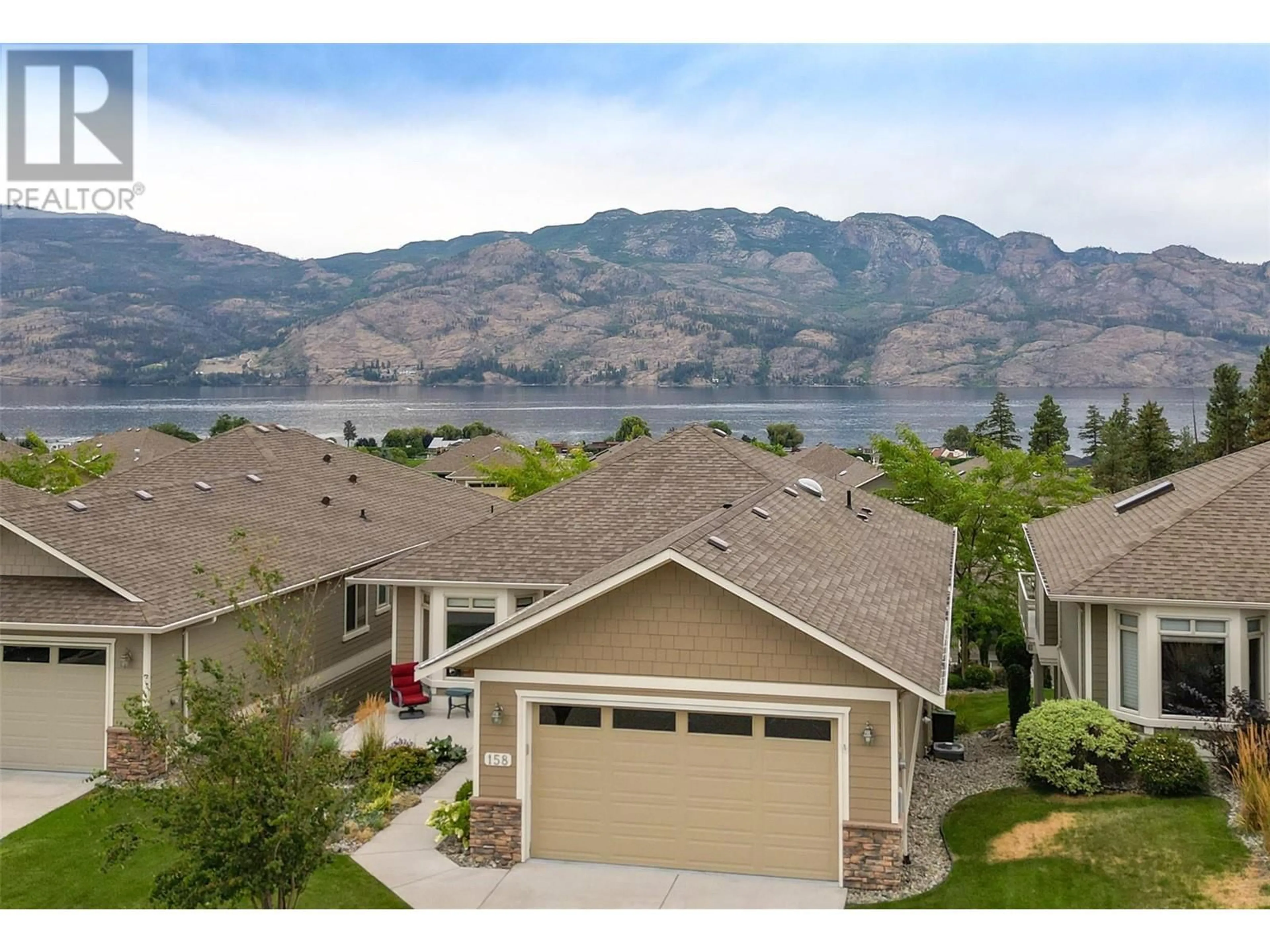 A pic from outside/outdoor area/front of a property/back of a property/a pic from drone, water/lake/river/ocean view for 158 - 4035 GELLATLY ROAD, West Kelowna British Columbia V4T1R7
