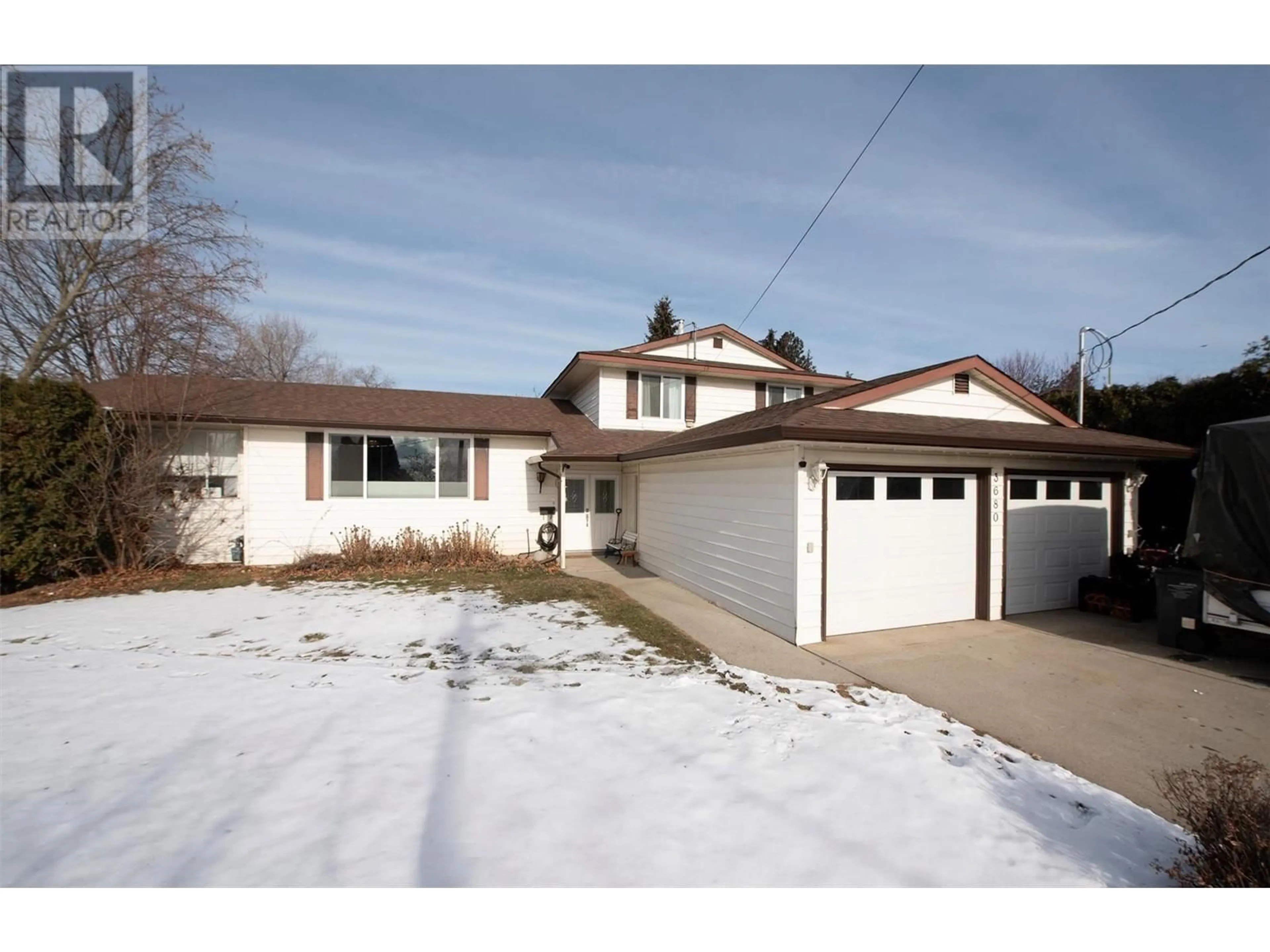 Home with vinyl exterior material, street for 3680 Glengarry Road, West Kelowna British Columbia V4T1J6