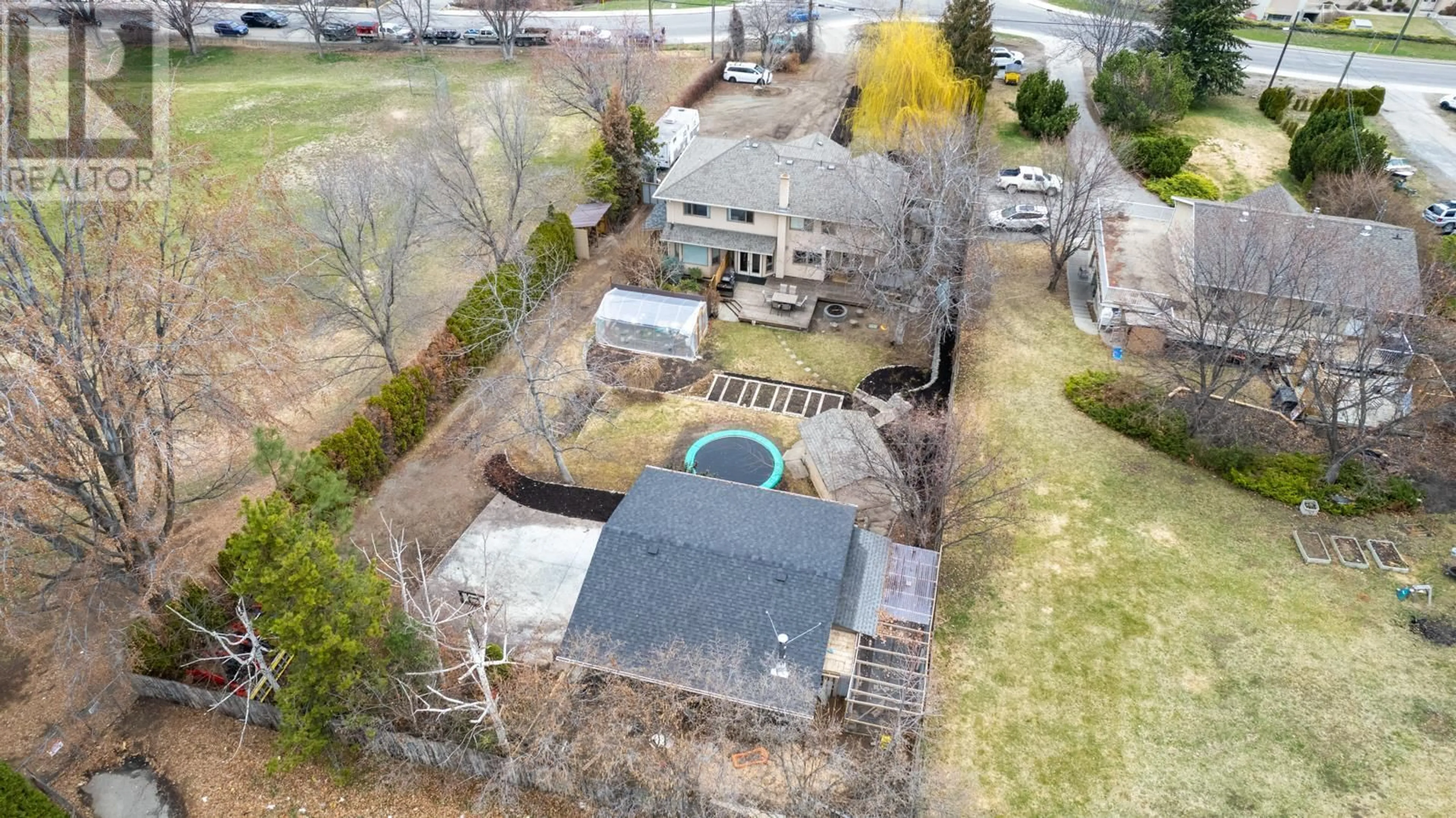 A pic from outside/outdoor area/front of a property/back of a property/a pic from drone, street for 1189 HUDSON ROAD, West Kelowna British Columbia V1Z1J2