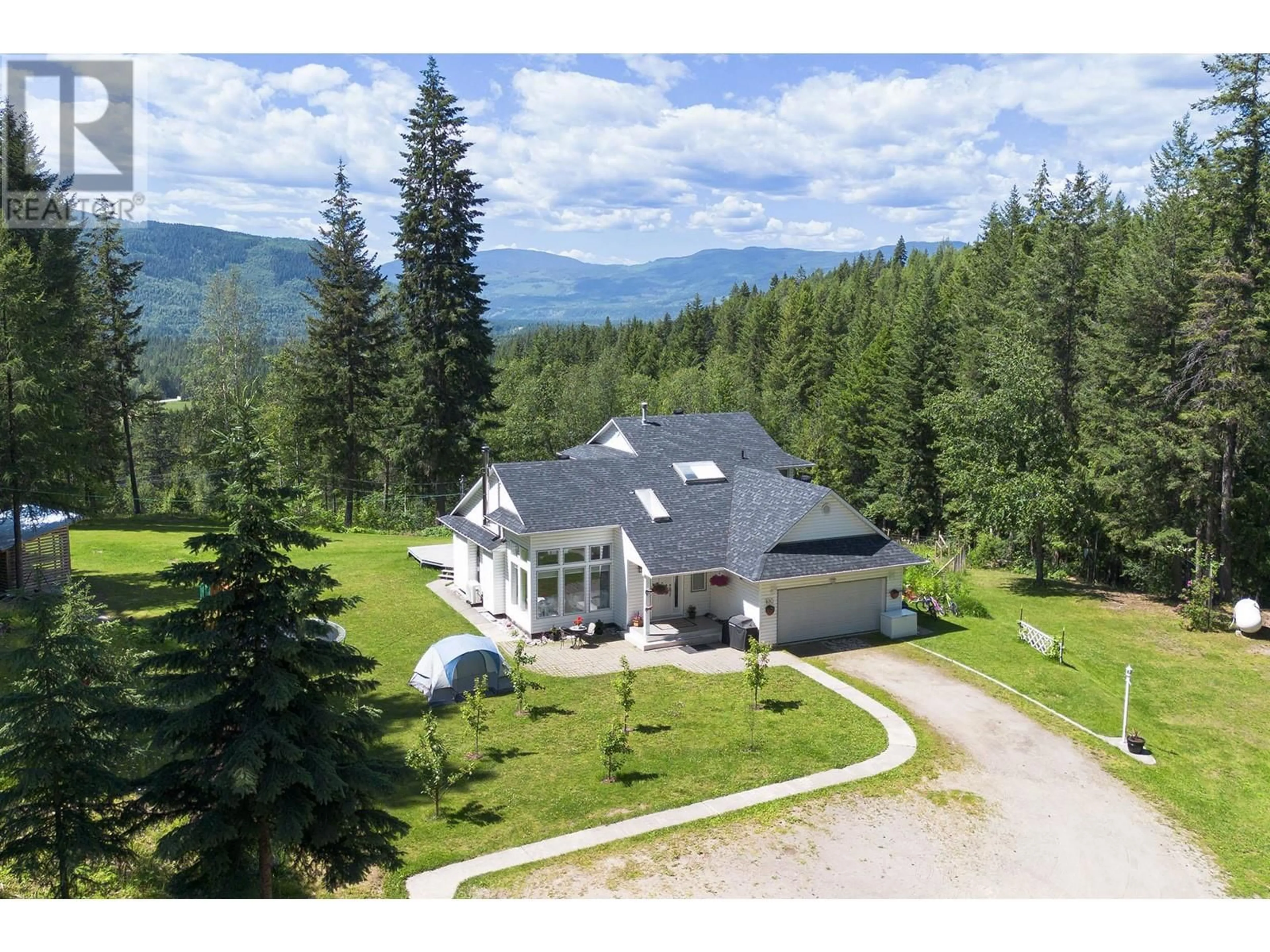 A pic from outside/outdoor area/front of a property/back of a property/a pic from drone, mountain view for 880 HEATHER Road, Clearwater British Columbia V0E1N0