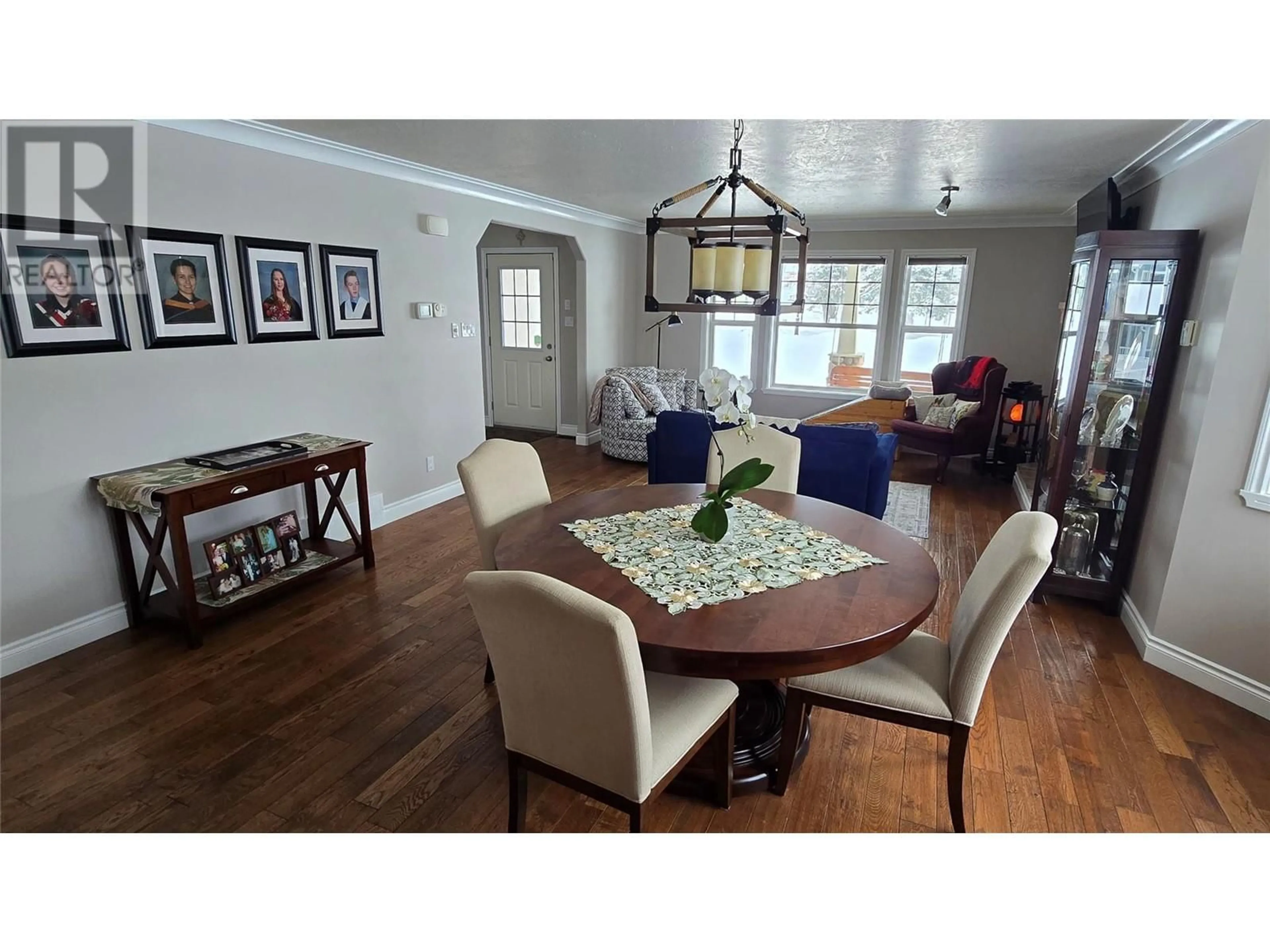 Dining room, wood/laminate floor for 1820 110 Avenue, Dawson Creek British Columbia V1G0A3