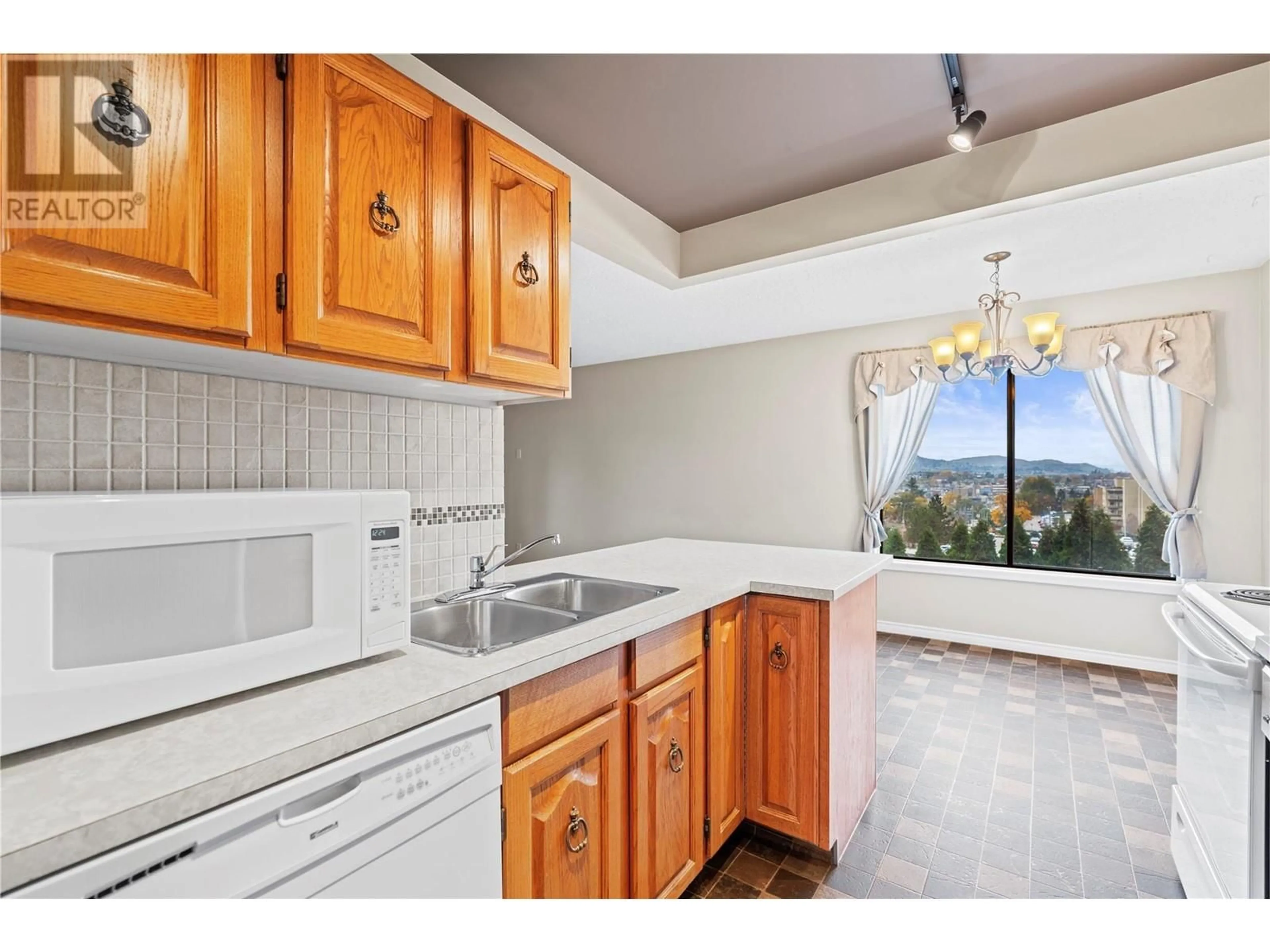 Standard kitchen, ceramic/tile floor for 1801 32 Street Unit# 202, Vernon British Columbia V1T5K4