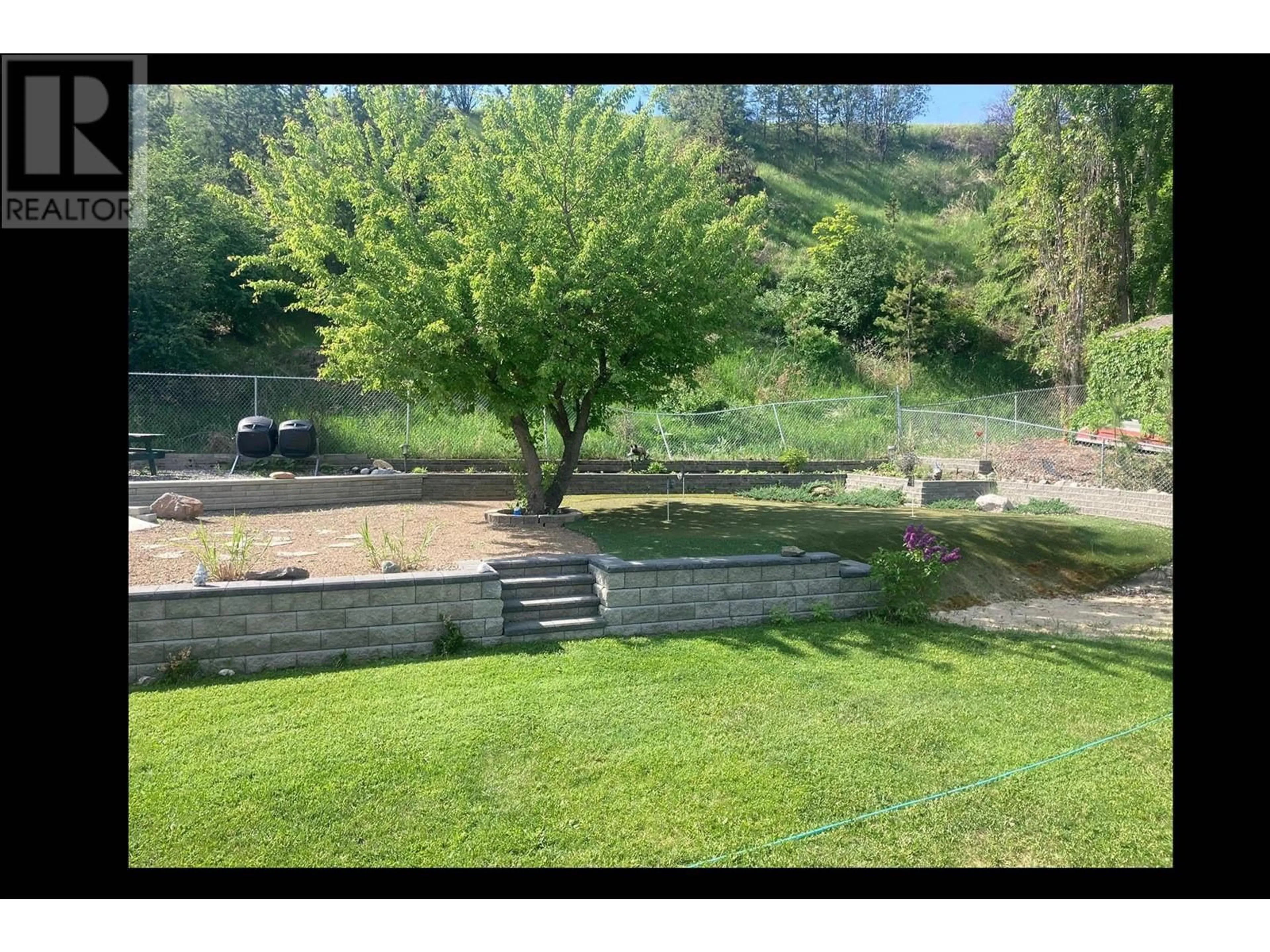 A pic from outside/outdoor area/front of a property/back of a property/a pic from drone, water/lake/river/ocean view for 929 GREYSTONE Crescent, Kamloops British Columbia V1S1K7