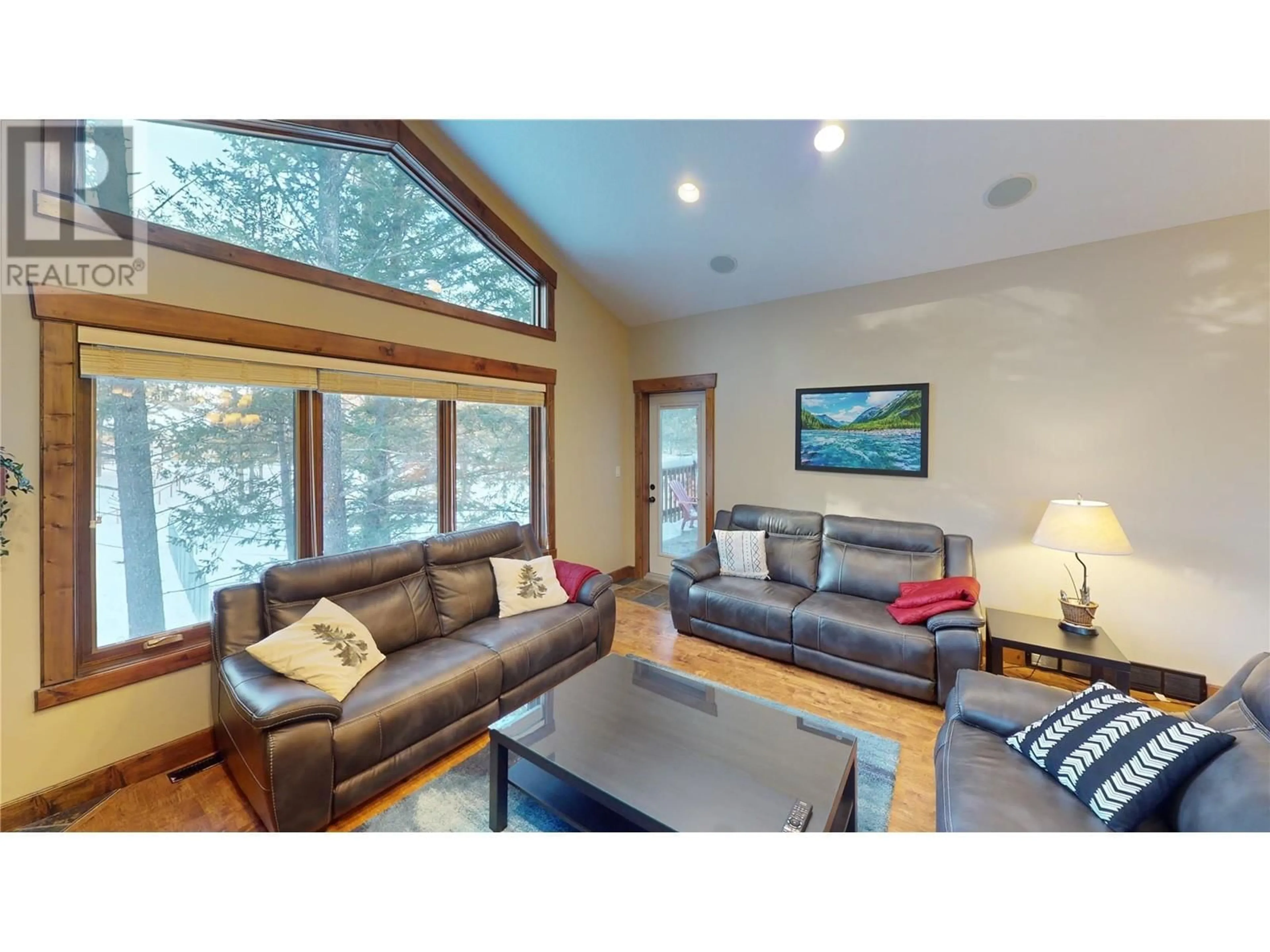 Living room with furniture, wood/laminate floor for 7307 Copperhorn Drive, Radium Hot Springs British Columbia V0A1M0