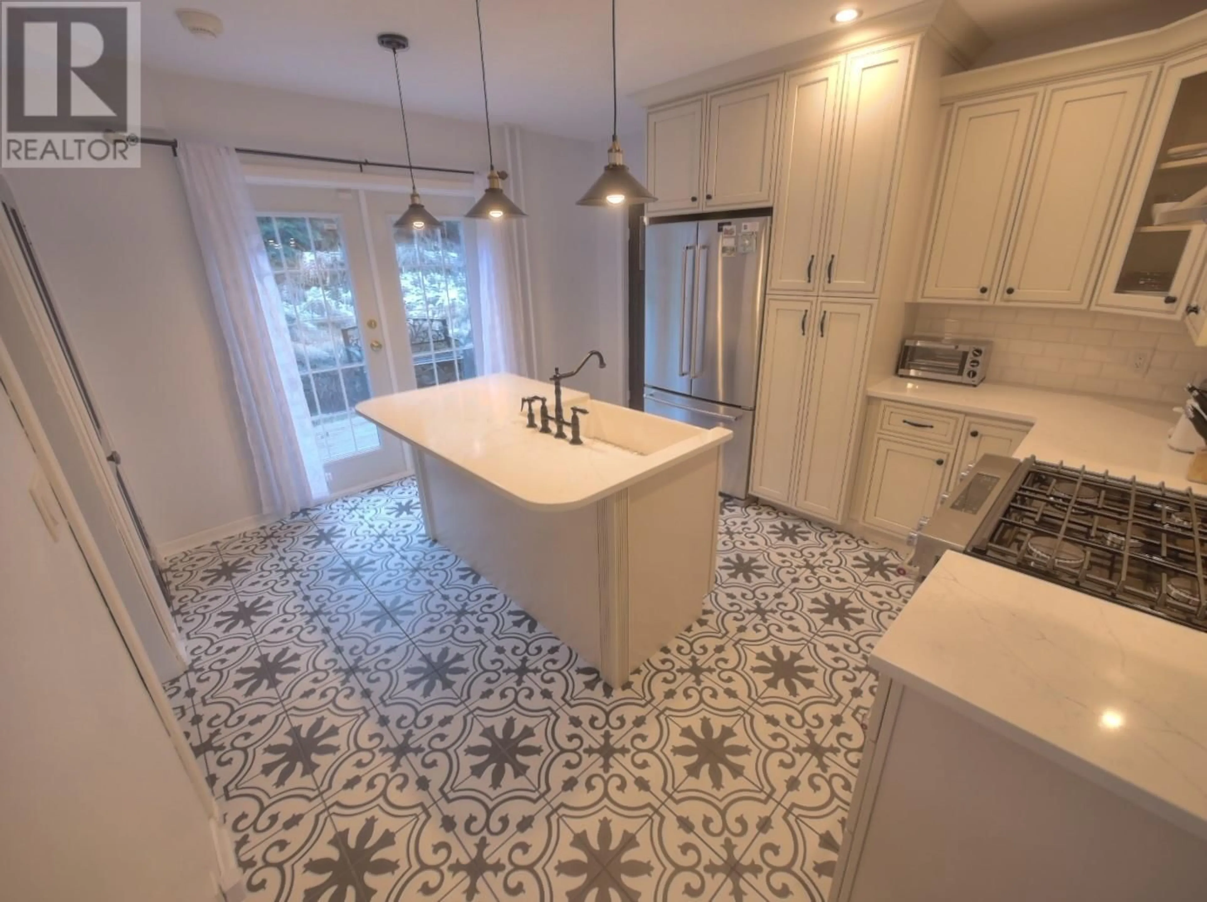 Open concept kitchen, ceramic/tile floor for 95 High Street, Nelson British Columbia V1L3Z5