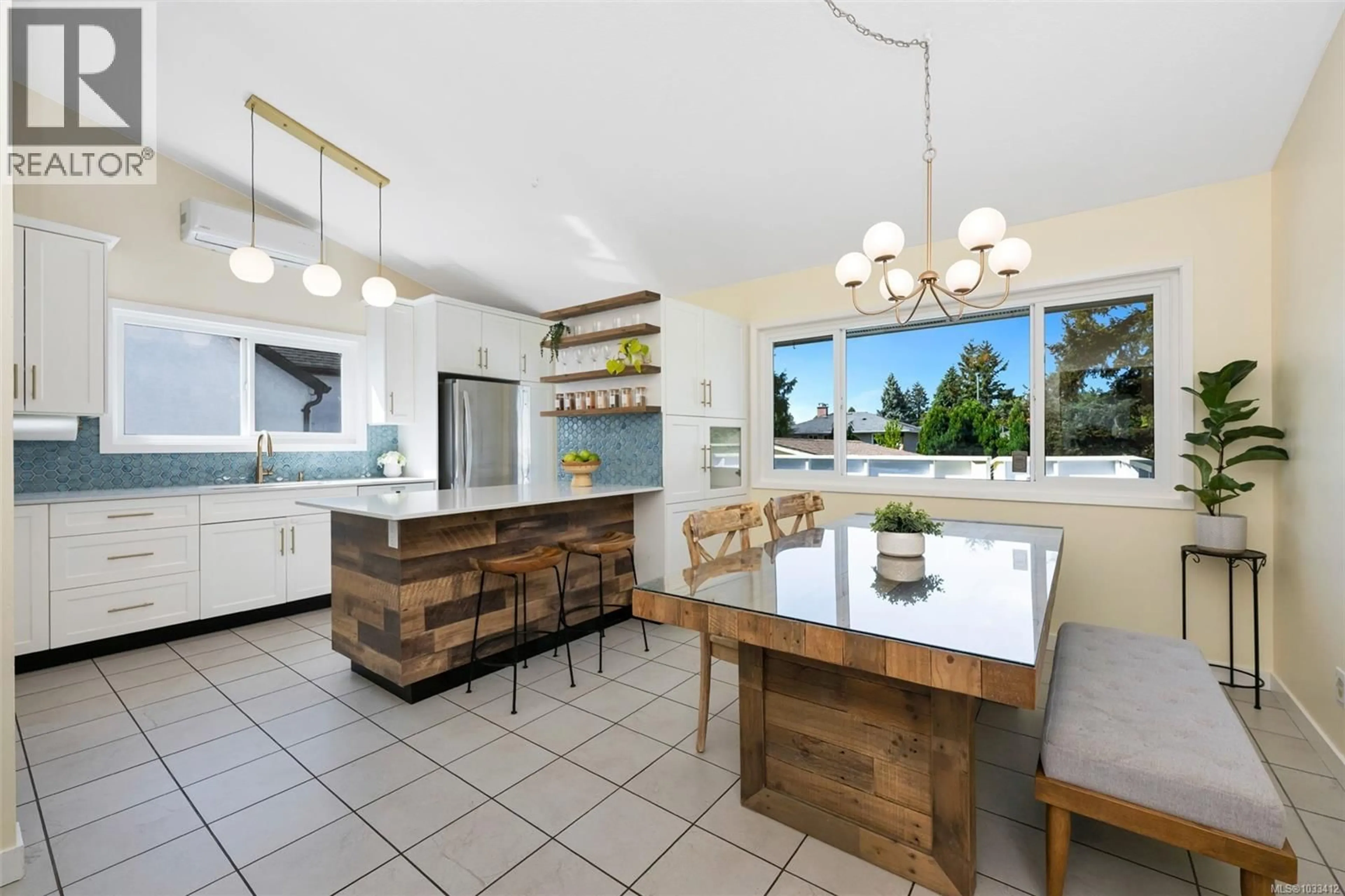 Open concept kitchen, ceramic/tile floor for 1826 NEWTON STREET, Saanich British Columbia V8R2R4