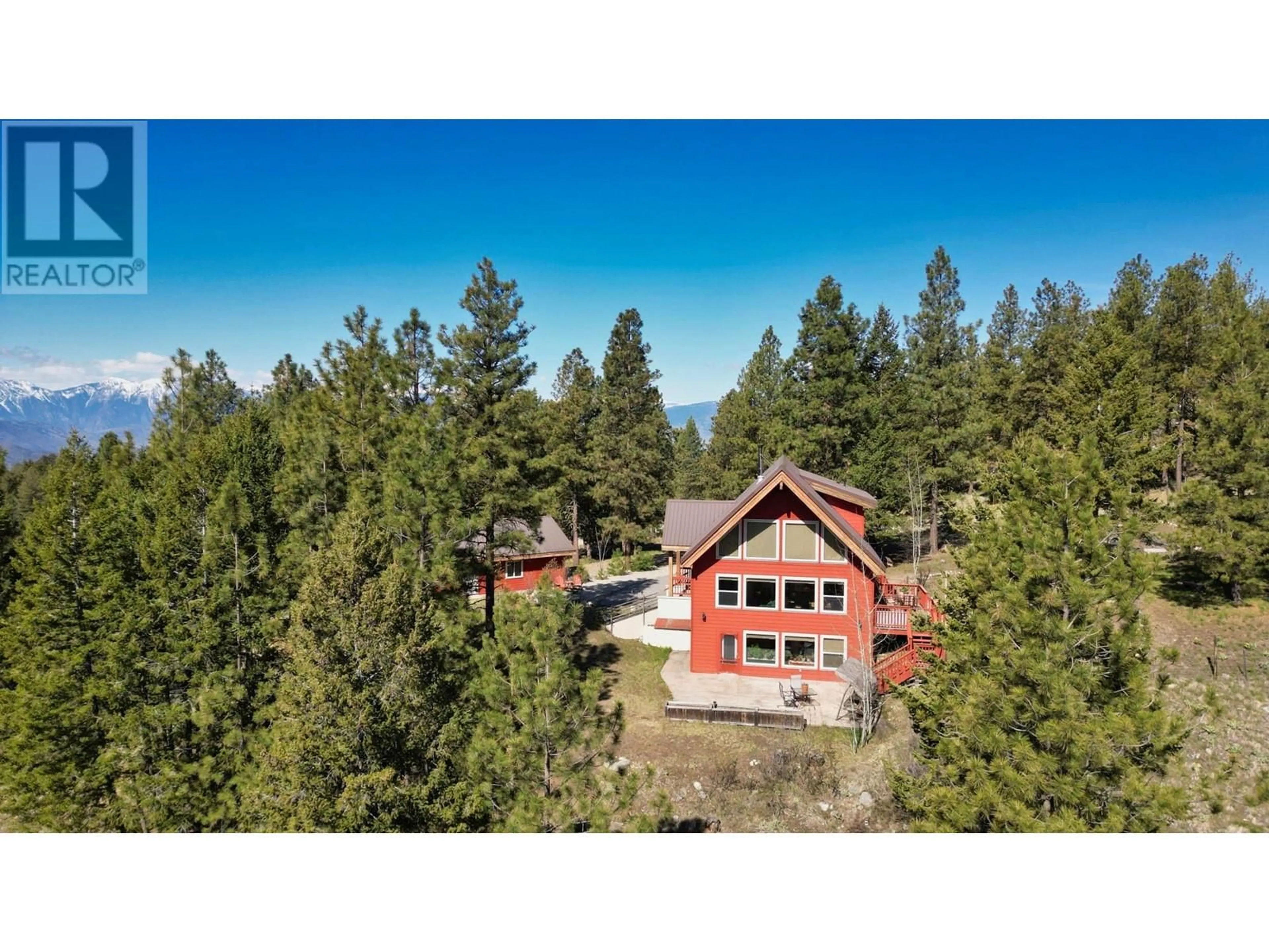 A pic from outside/outdoor area/front of a property/back of a property/a pic from drone, forest/trees view for 155 COUGAR COURT COURT, Osoyoos British Columbia V0H1V6