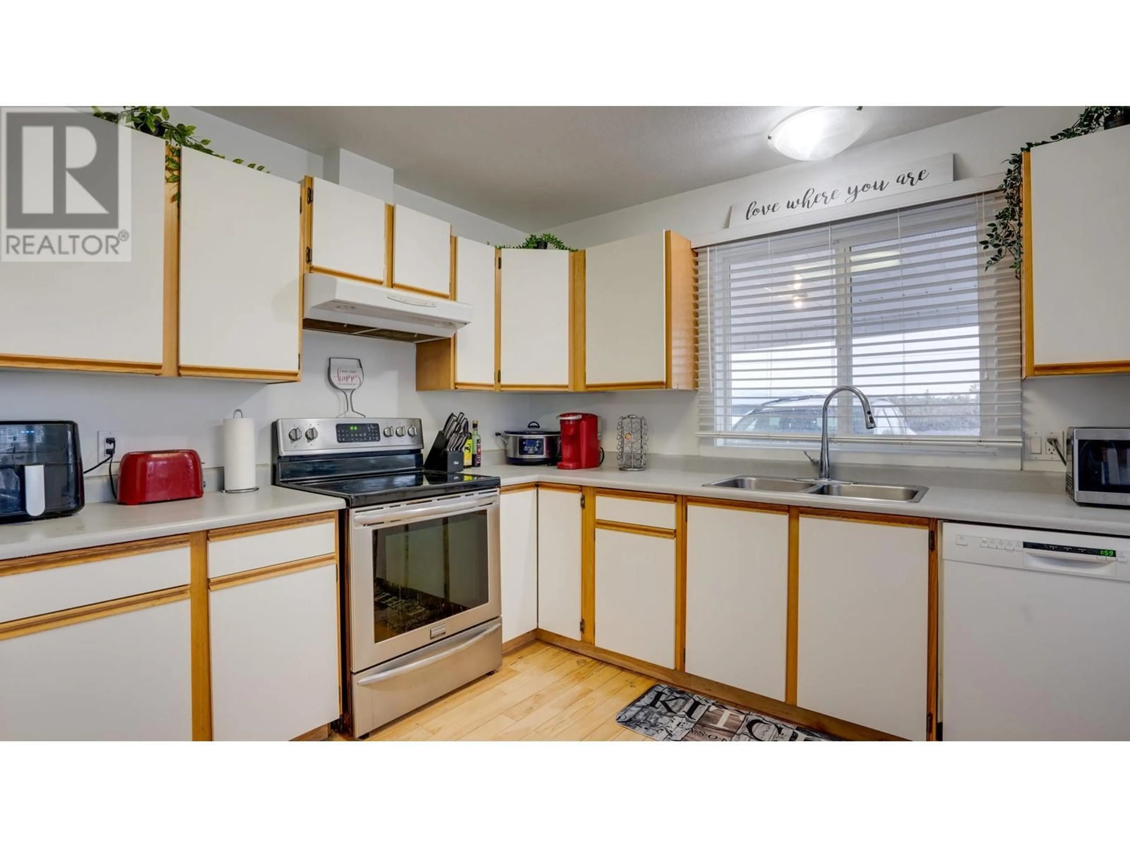 Standard kitchen, wood/laminate floor for 1041 Middleton Way Unit# 103, Vernon British Columbia V1B2N3