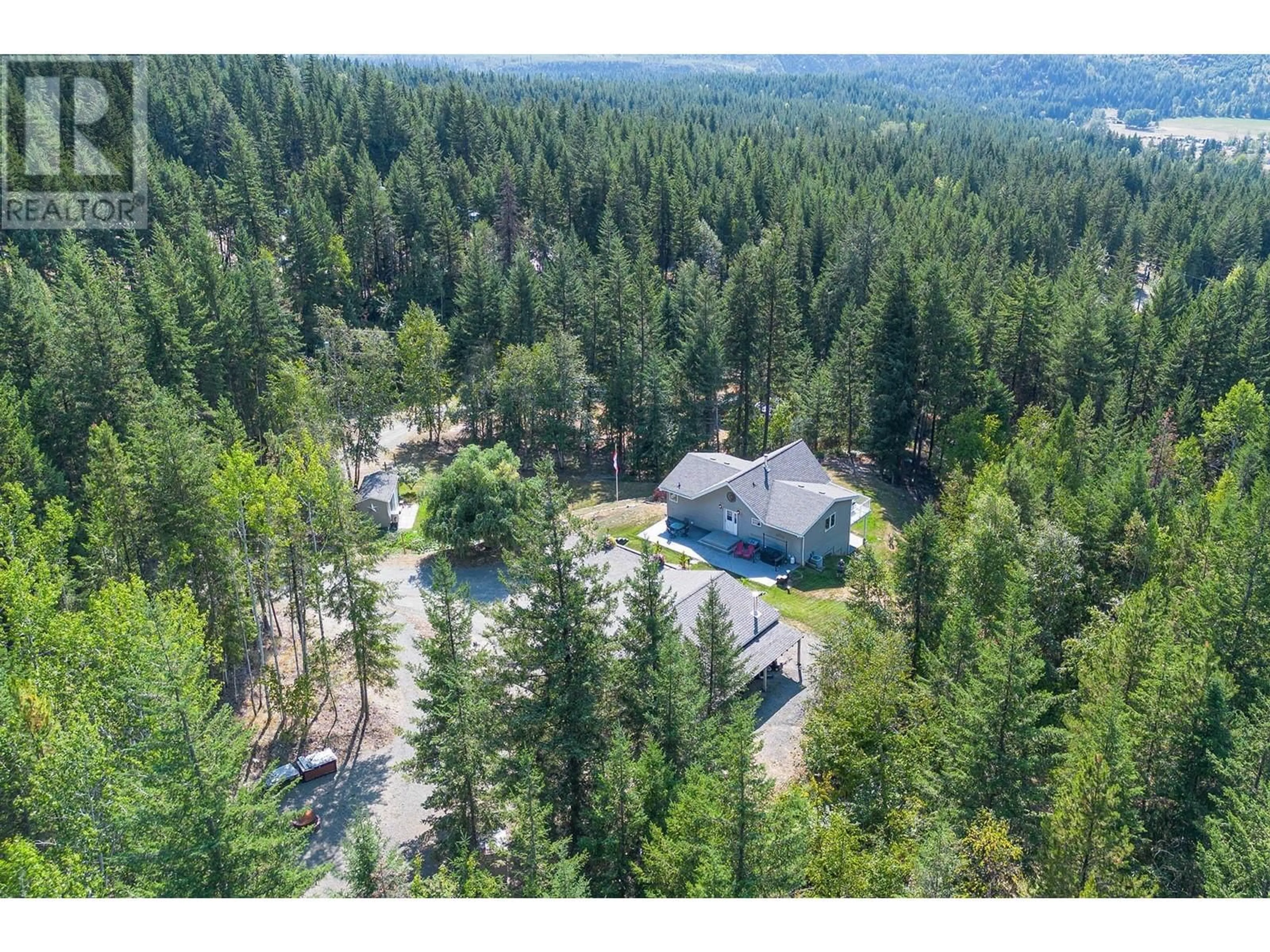 A pic from outside/outdoor area/front of a property/back of a property/a pic from drone, forest/trees view for 3520 GLENGROVE Road, Barriere British Columbia V0E2E0