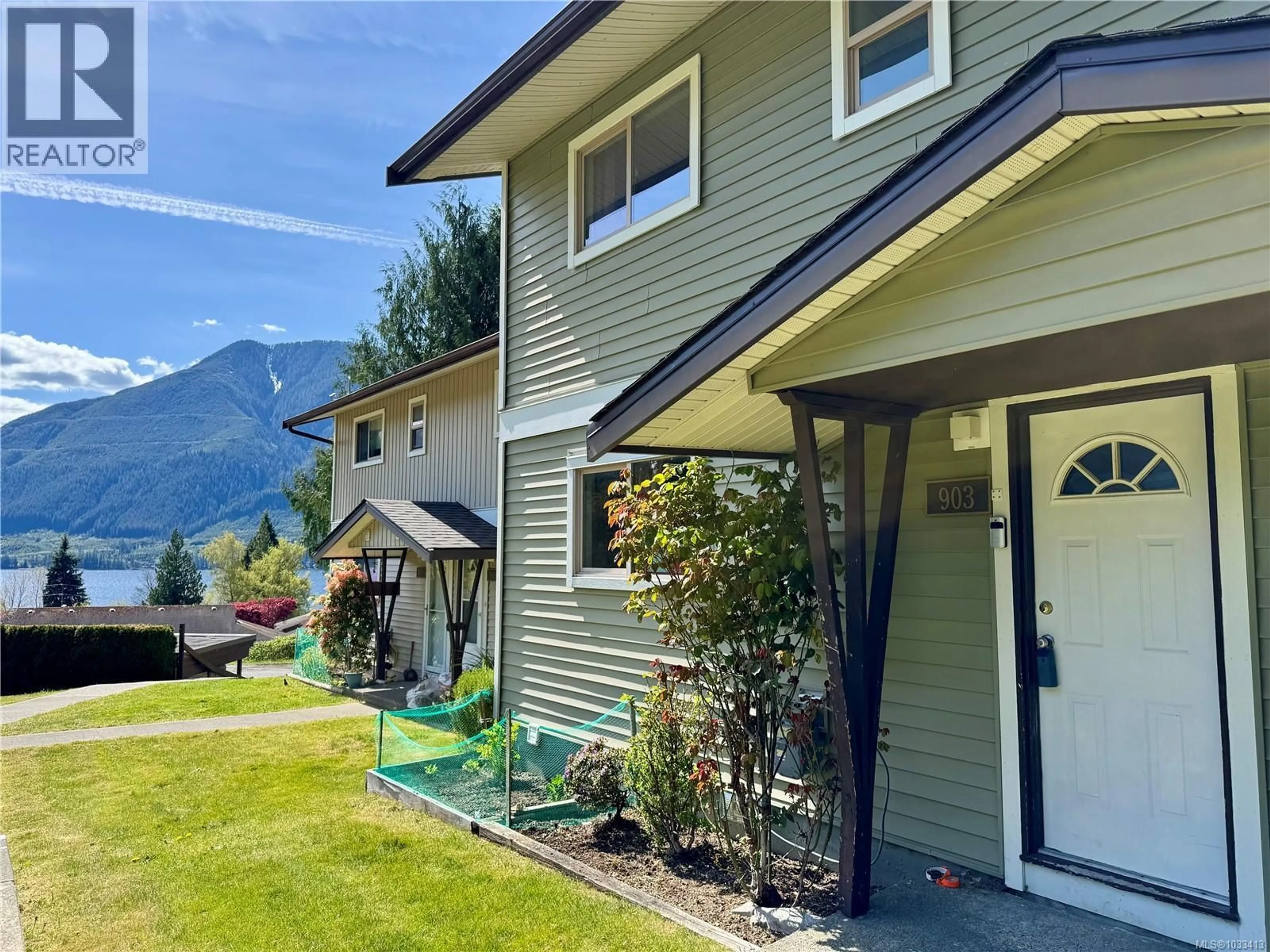 Home with vinyl exterior material, mountain view for 903 MAQUINNA AVENUE, Port Alice British Columbia V0N2N0