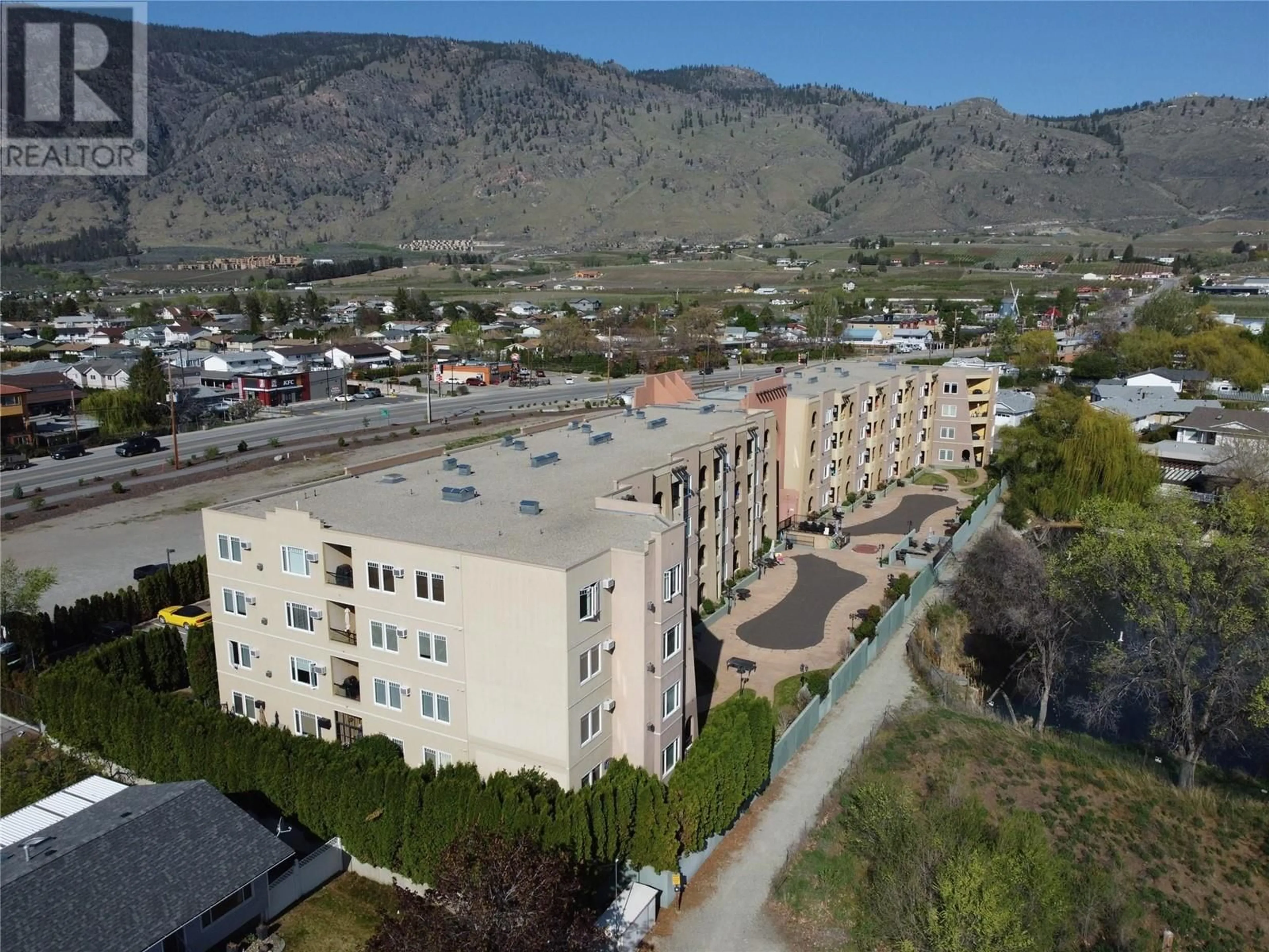 A pic from outside/outdoor area/front of a property/back of a property/a pic from drone, mountain view for 15 SOLANA KEY Court Unit# 210, Osoyoos British Columbia V0H1V4