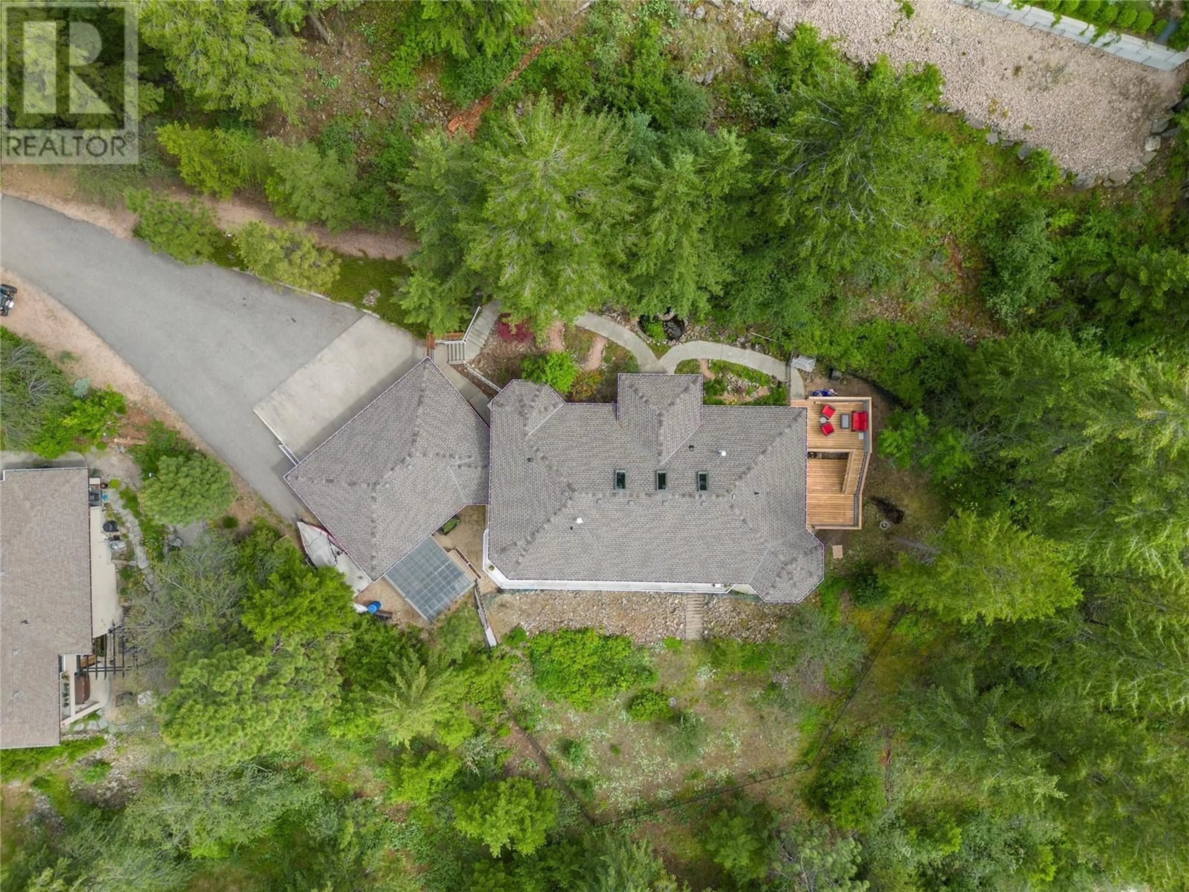 A pic from outside/outdoor area/front of a property/back of a property/a pic from drone, street for 46 Farchant Way, Vernon British Columbia V1H1E3