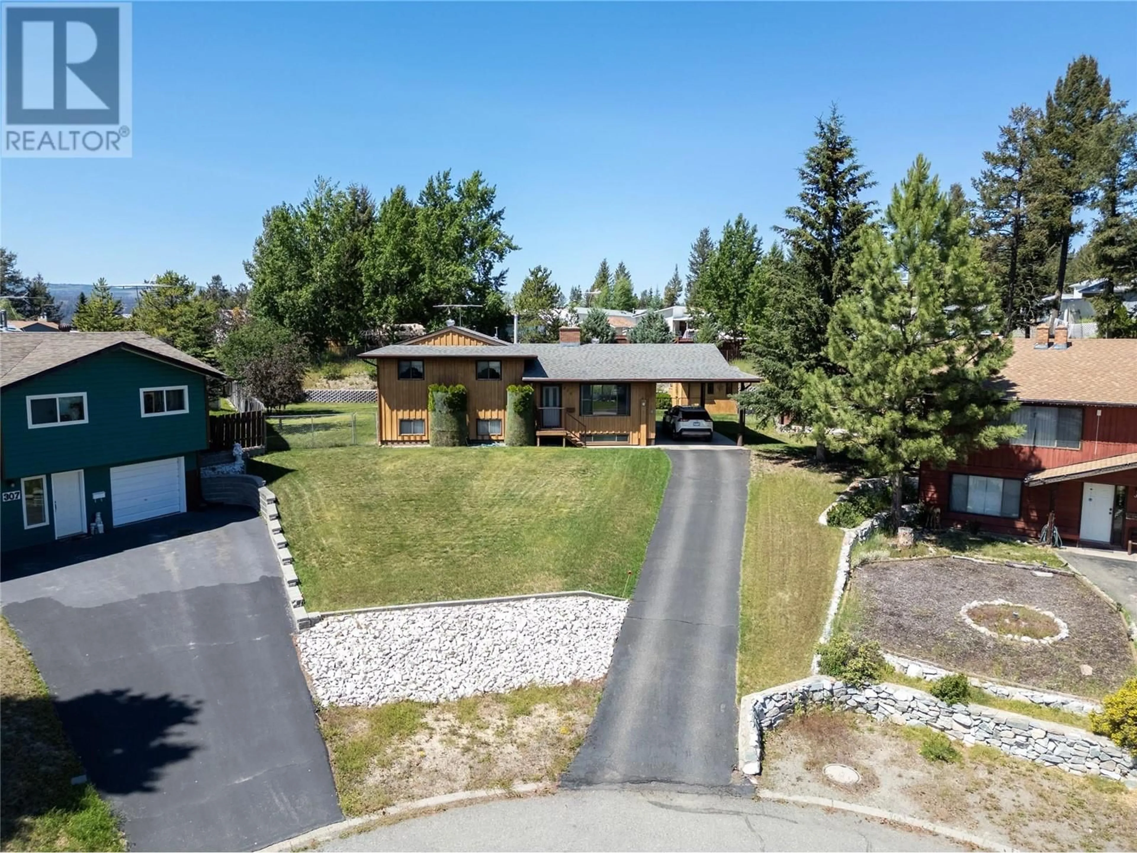 A pic from outside/outdoor area/front of a property/back of a property/a pic from drone, mountain view for 310 CINNIBAR Court, Logan Lake British Columbia V0K1W0