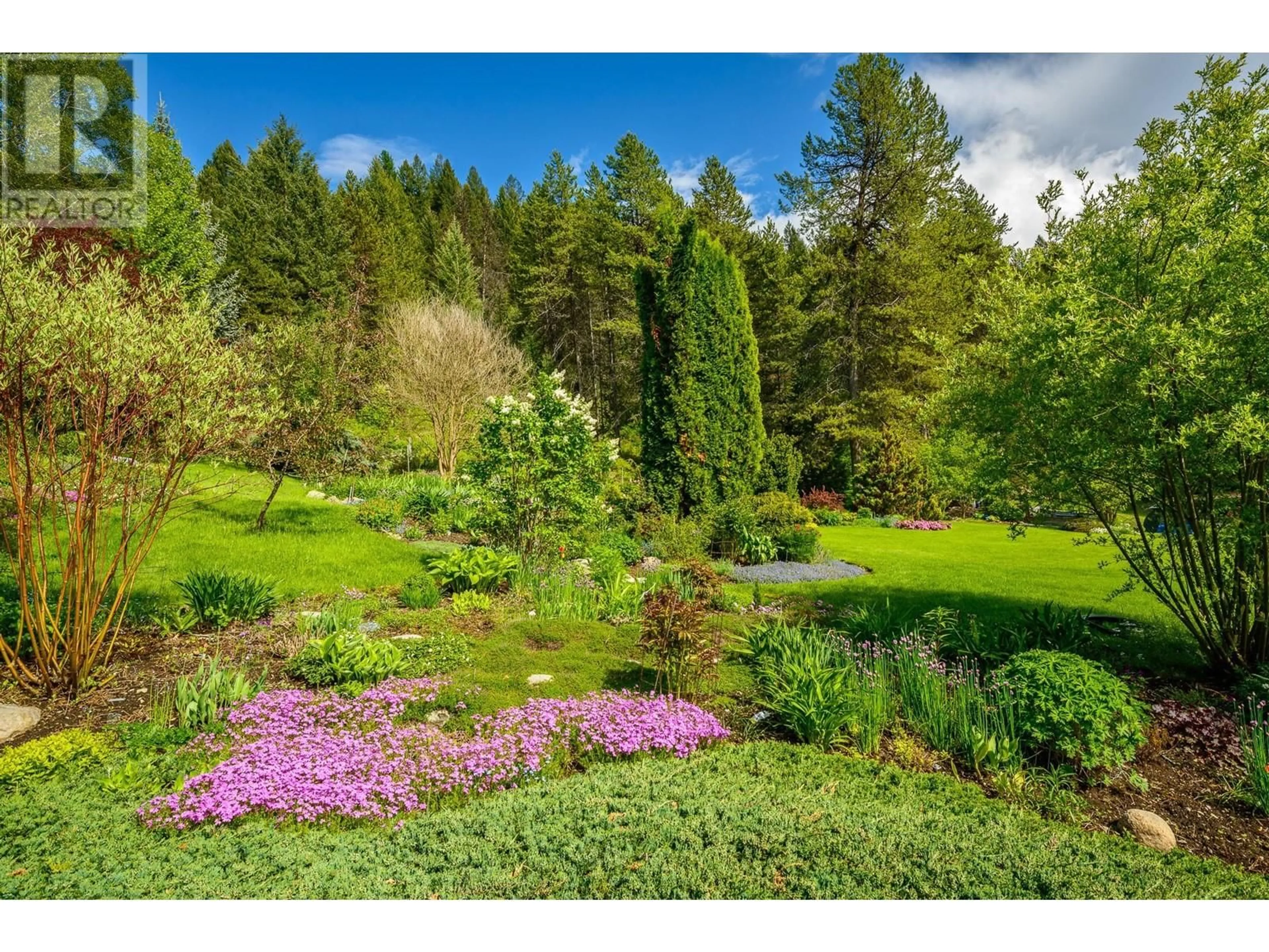 A pic from outside/outdoor area/front of a property/back of a property/a pic from drone, forest/trees view for 1075 Berta Street, Greenwood British Columbia V0H1J0