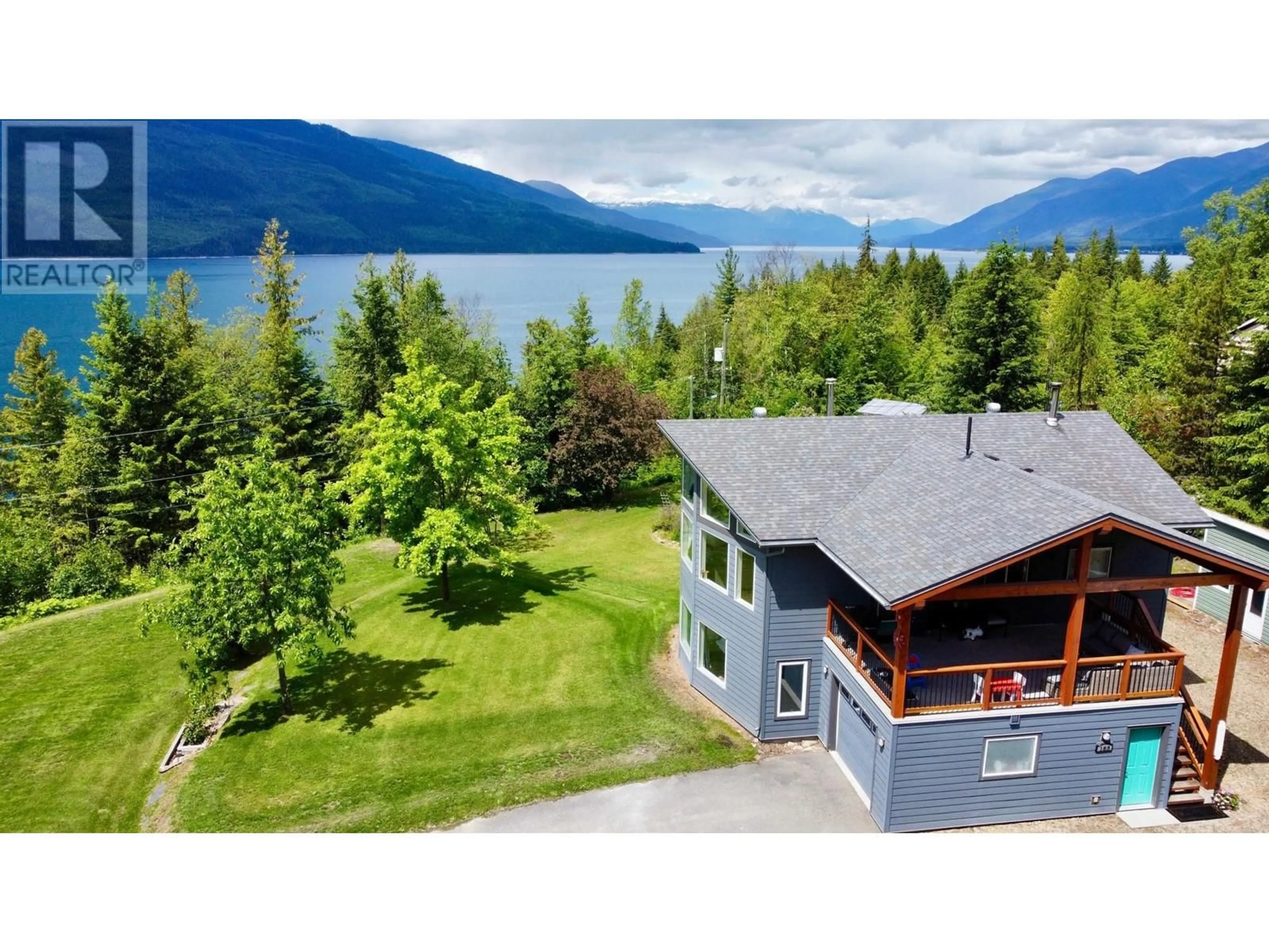 A pic from outside/outdoor area/front of a property/back of a property/a pic from drone, water/lake/river/ocean view for 185 DONNELLYS ROAD, Nakusp British Columbia V0G1R1