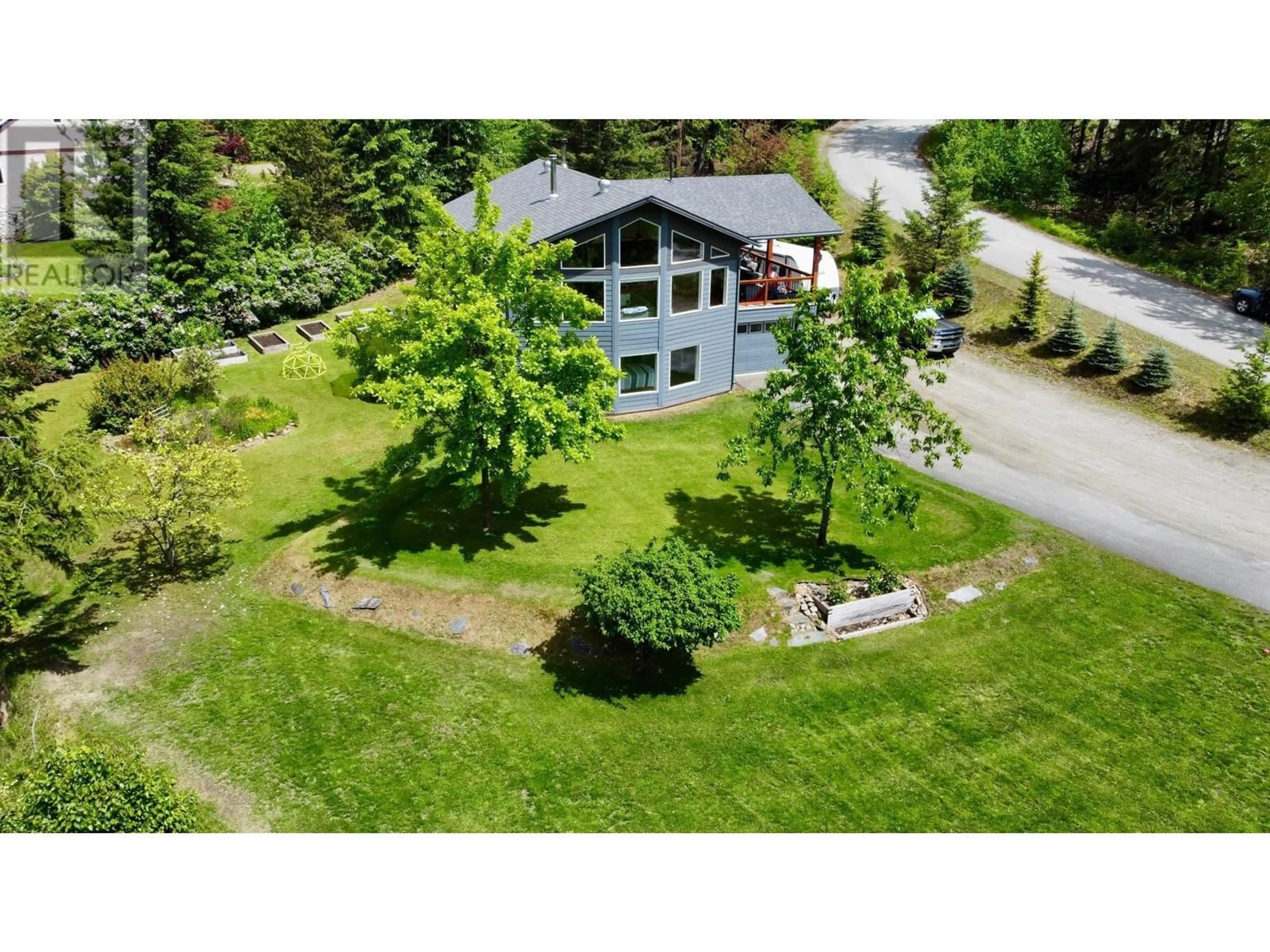 A pic from outside/outdoor area/front of a property/back of a property/a pic from drone, mountain view for 185 DONNELLYS ROAD, Nakusp British Columbia V0G1R1