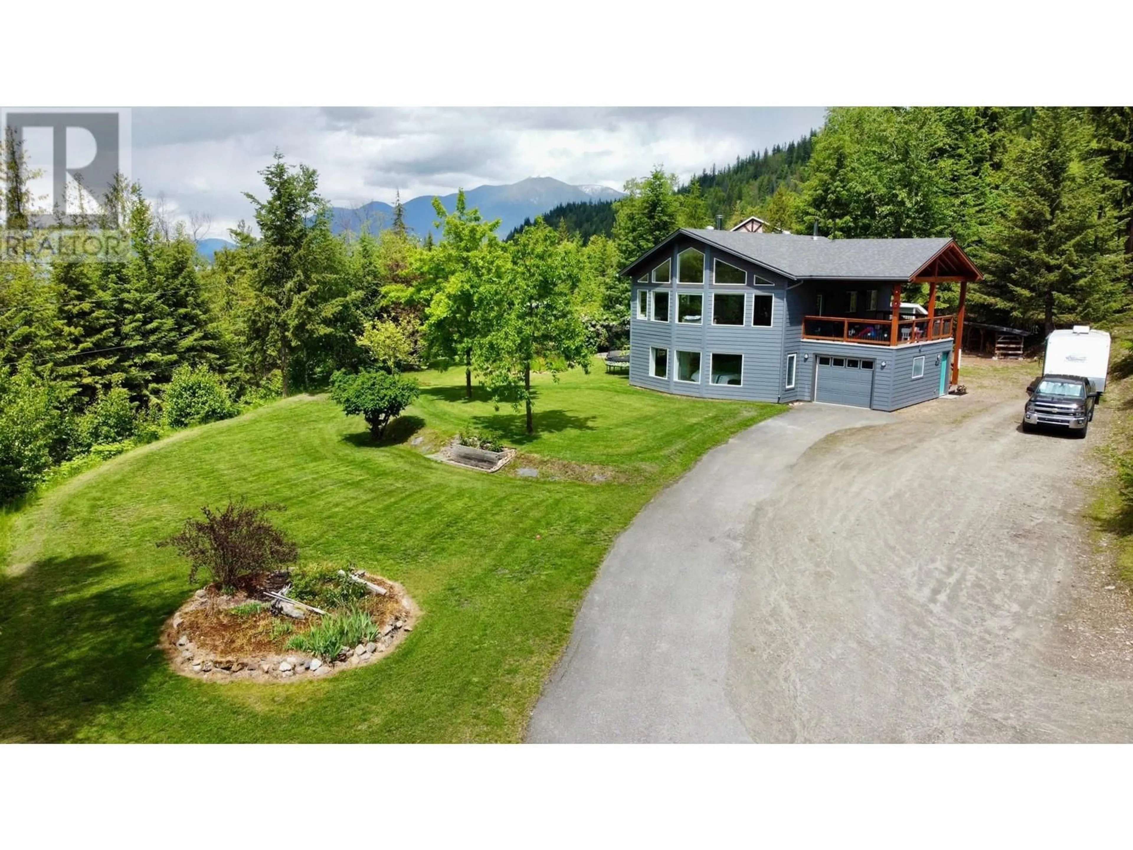 A pic from outside/outdoor area/front of a property/back of a property/a pic from drone, mountain view for 185 DONNELLYS Road, Nakusp British Columbia V0G1R1