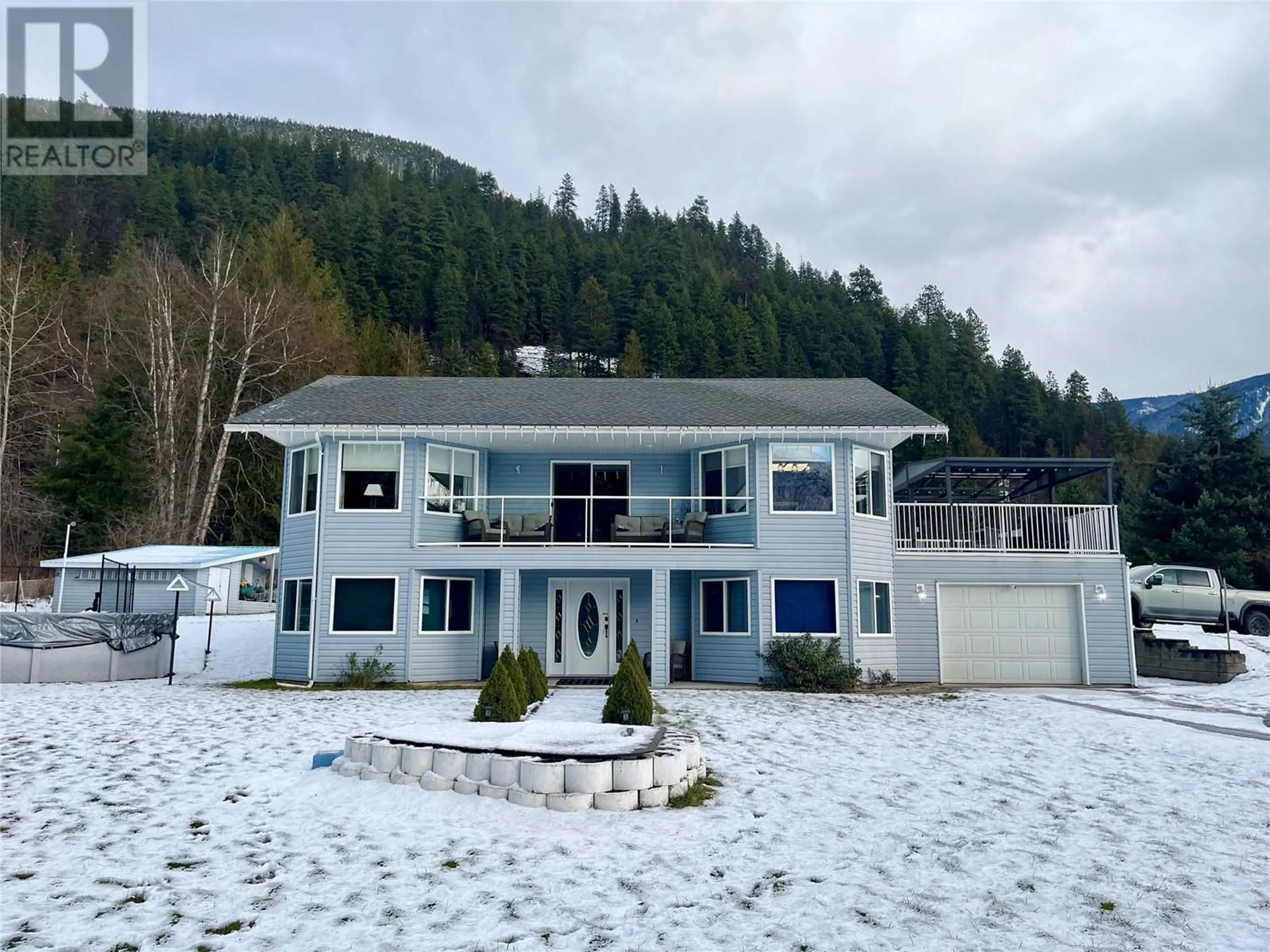 A pic from outside/outdoor area/front of a property/back of a property/a pic from drone, mountain view for 213 Burton School Road, Burton British Columbia V0G1R0