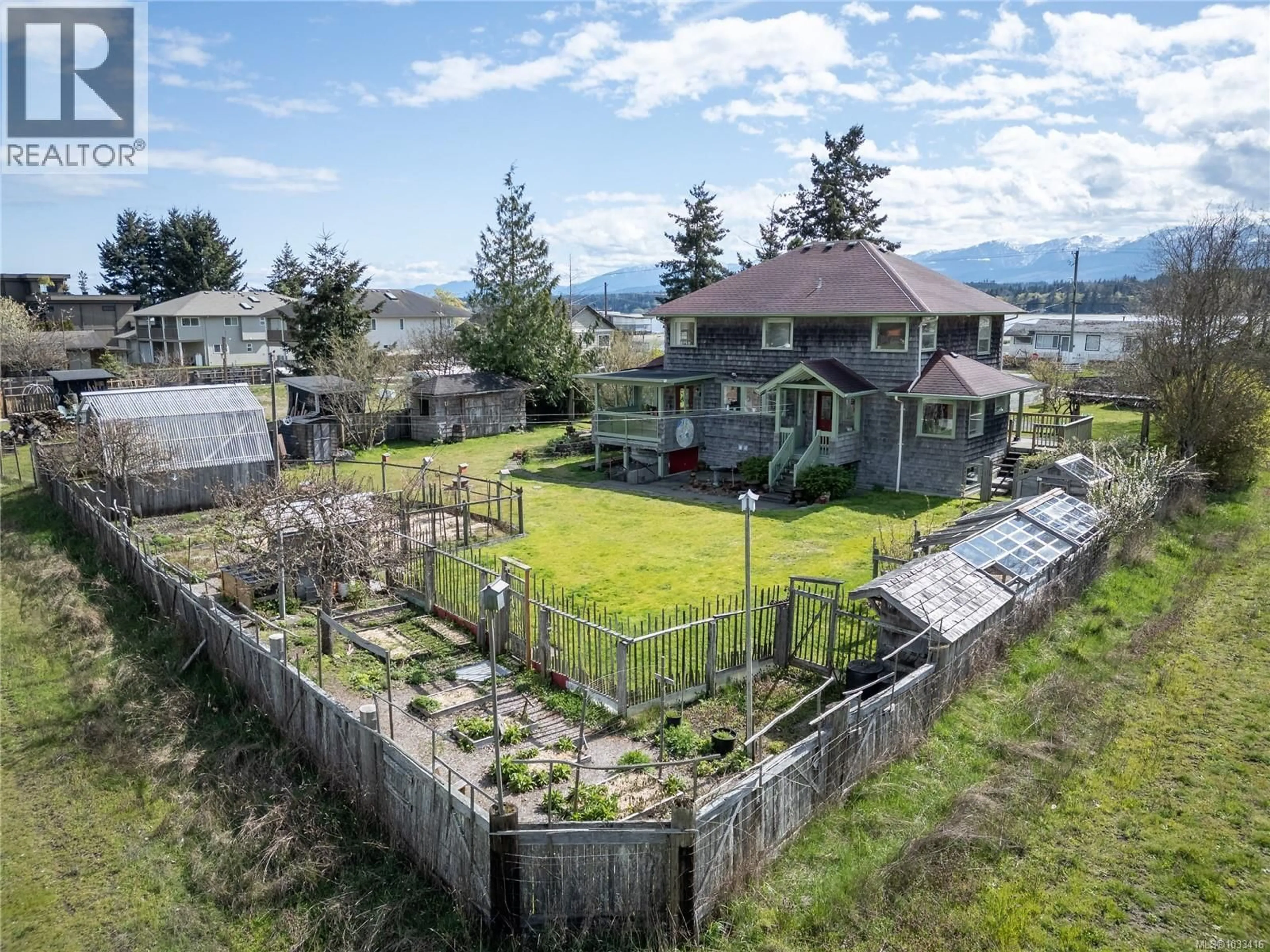 A pic from outside/outdoor area/front of a property/back of a property/a pic from drone, water/lake/river/ocean view for 2854 FARM VIEW ROAD, Courtenay British Columbia V9N9C7