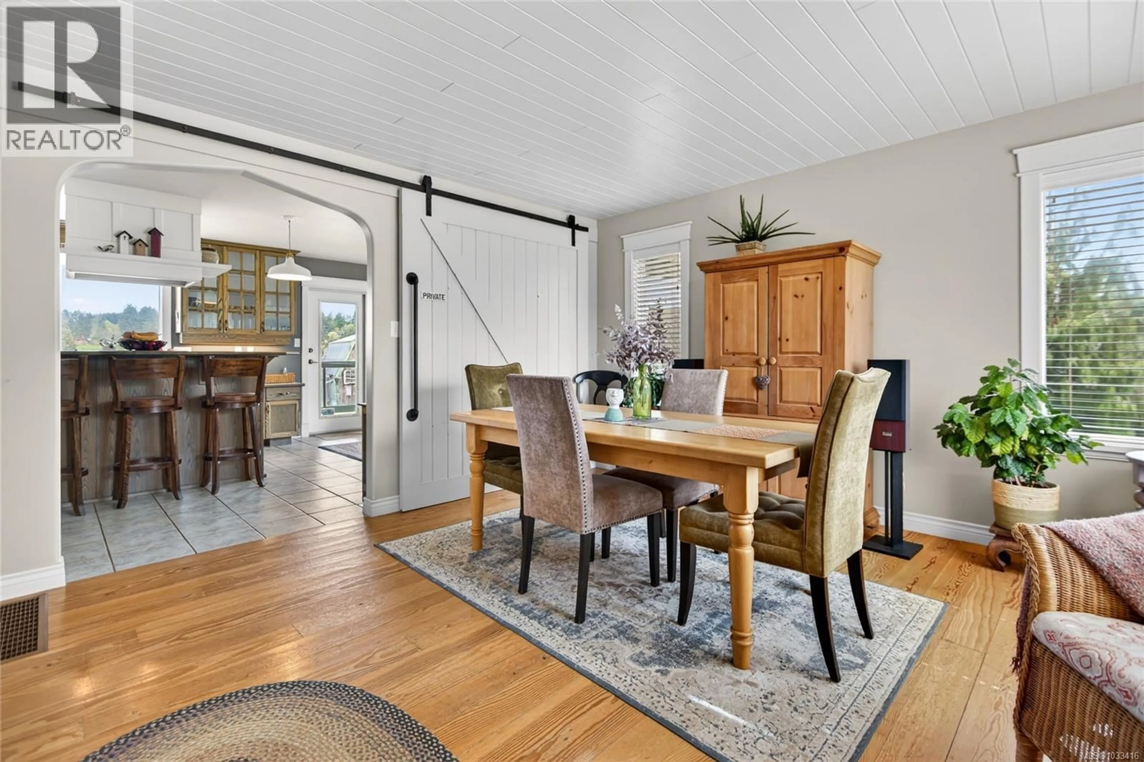 Dining room, wood/laminate floor for 2854 FARM VIEW ROAD, Courtenay British Columbia V9N9C7