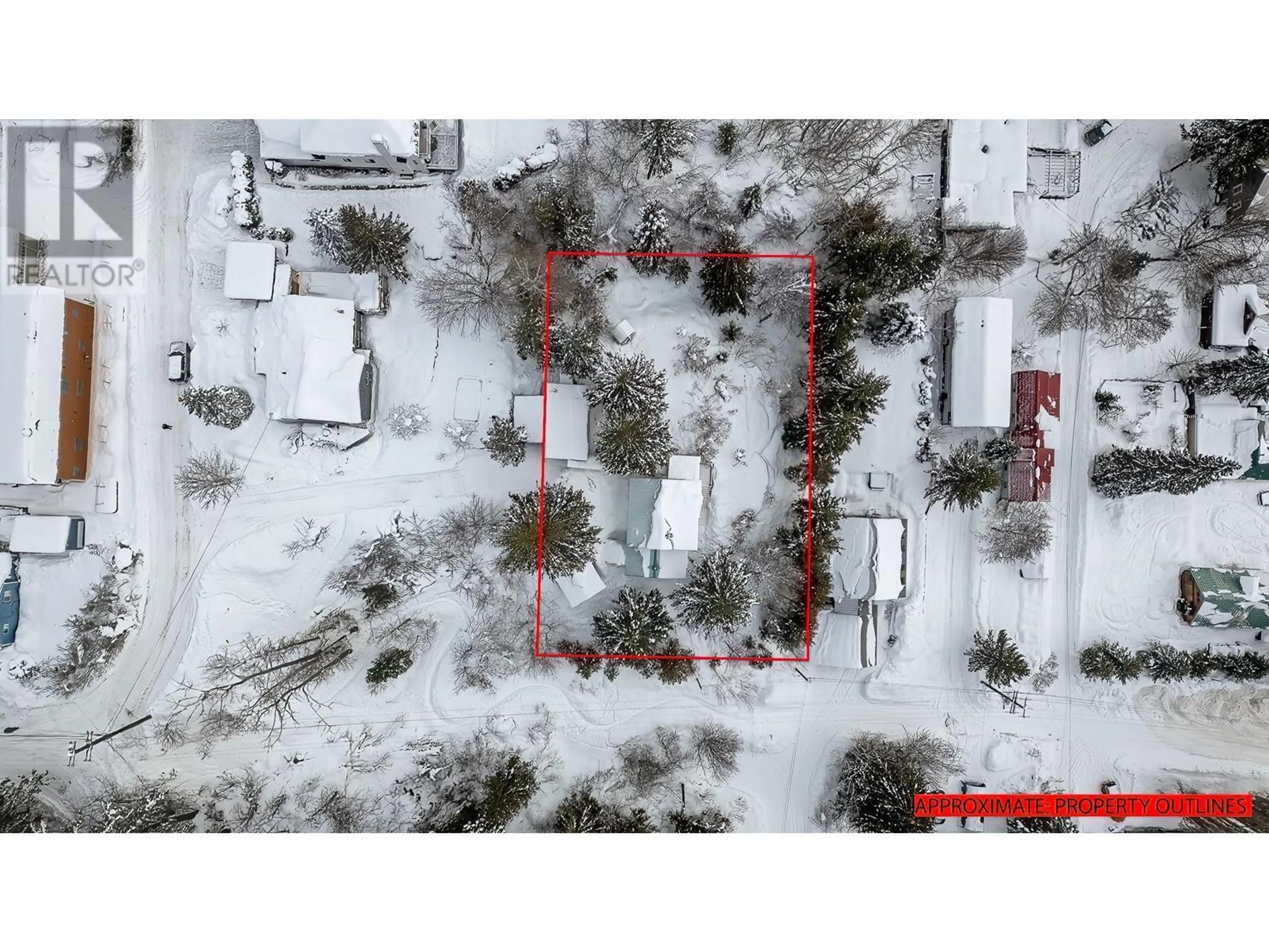 A pic from outside/outdoor area/front of a property/back of a property/a pic from drone, street for 2090 Davis Street, Rossland British Columbia V0G1Y0