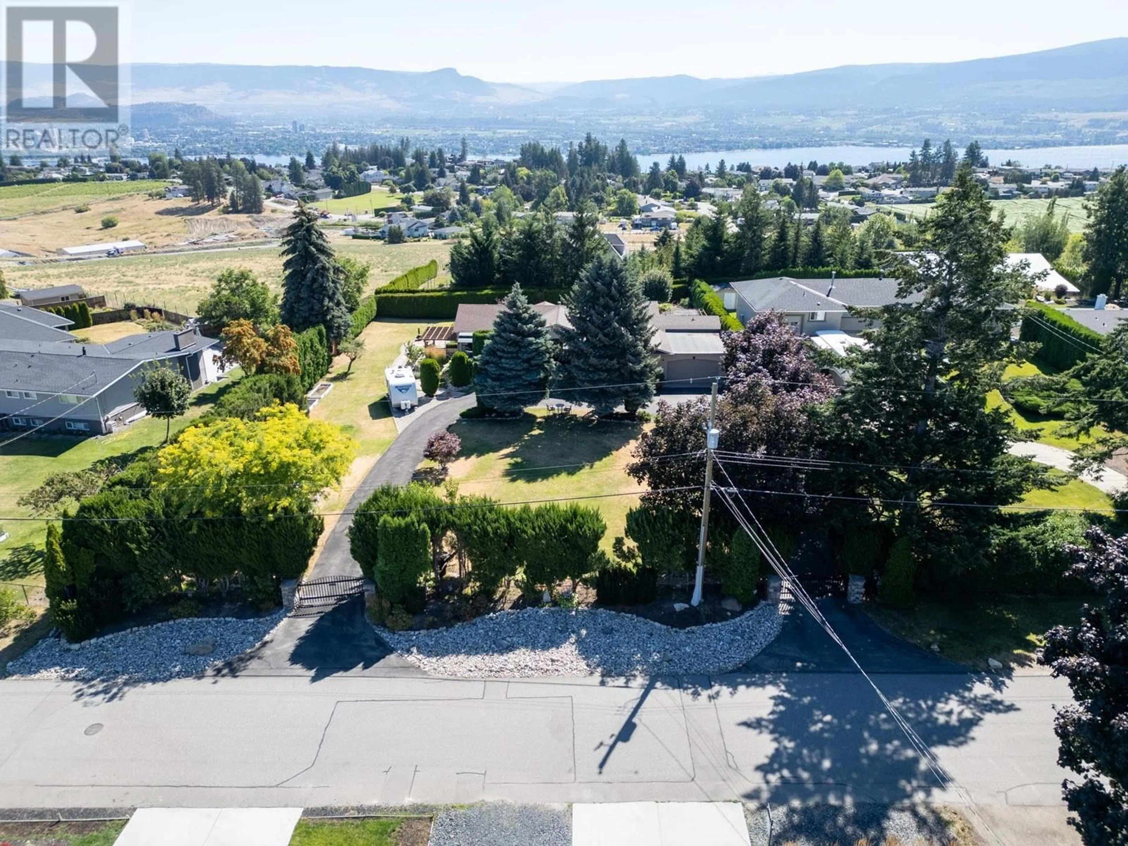 A pic from outside/outdoor area/front of a property/back of a property/a pic from drone, water/lake/river/ocean view for 2465 Harmon Road, West Kelowna British Columbia V1Z2C1