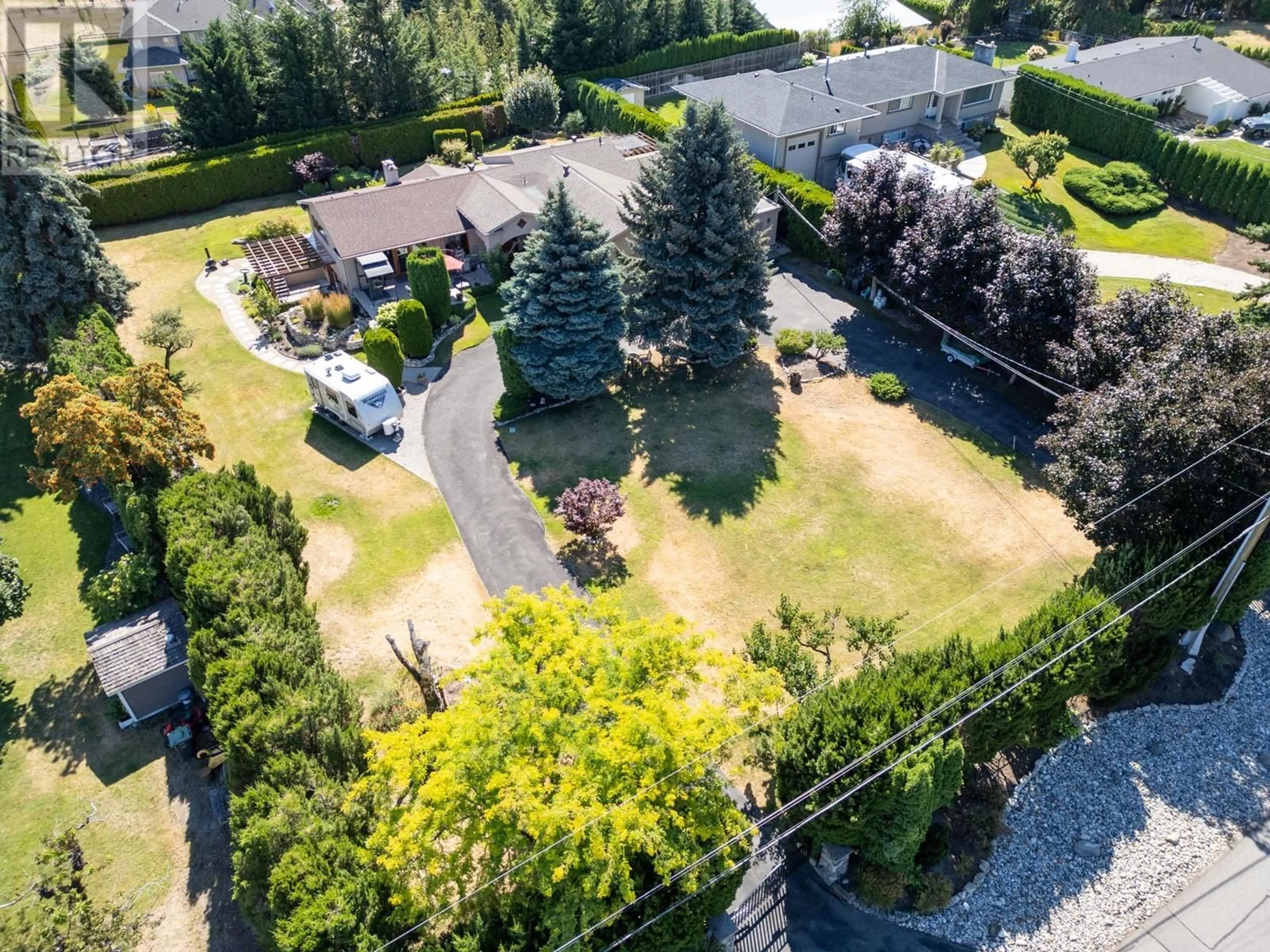 A pic from outside/outdoor area/front of a property/back of a property/a pic from drone, unknown for 2465 Harmon Road, West Kelowna British Columbia V1Z2C1